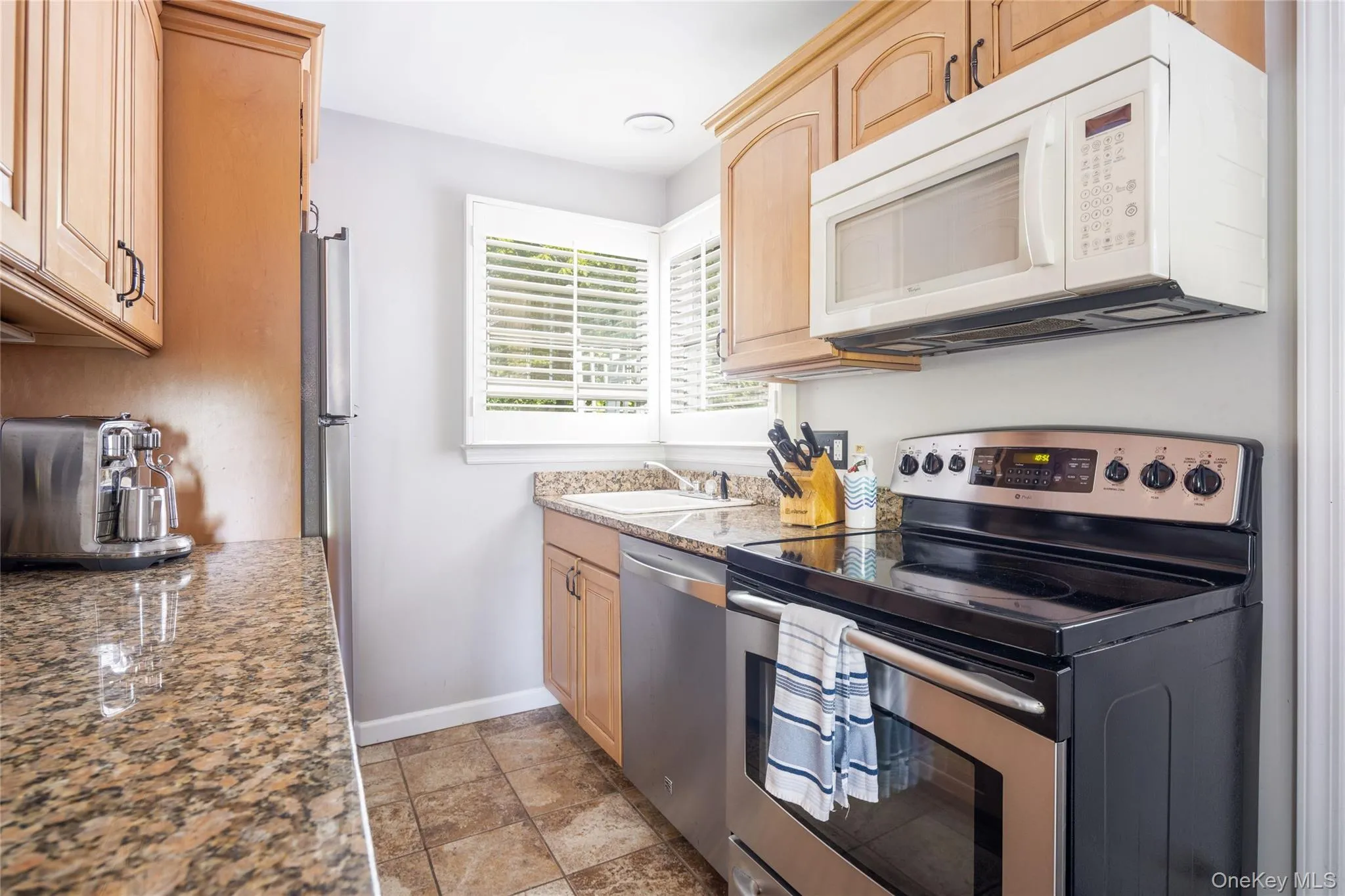 Galley kitchen with stainless steel appliances Galley kitchen with stainless steel appliances