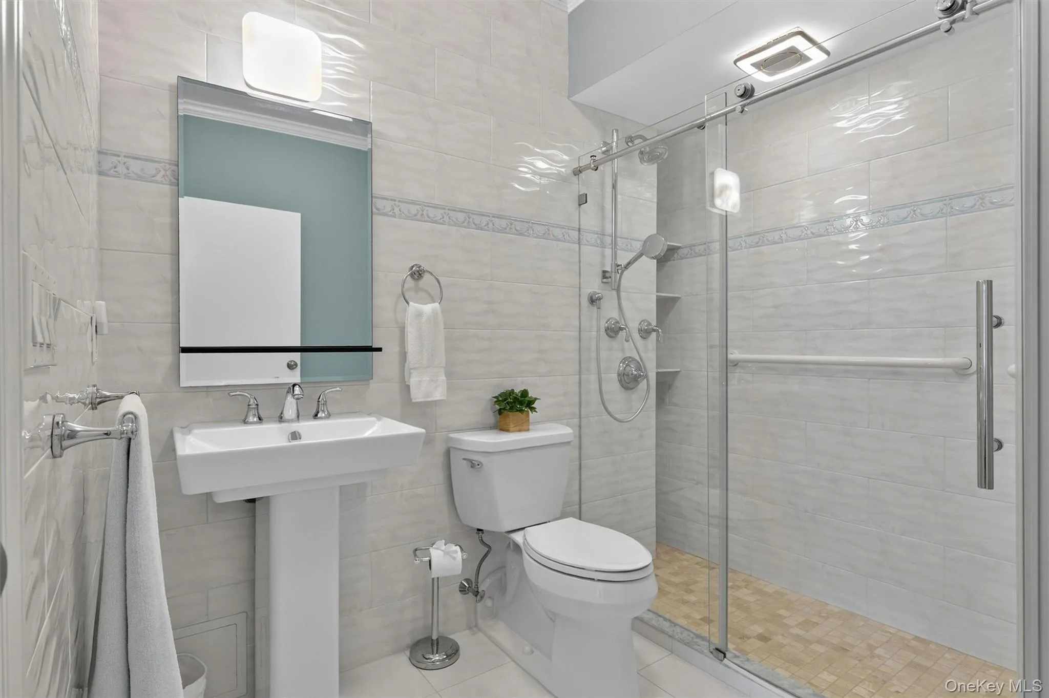 Modern, sleek bath with easy step-in shower. Modern, sleek bath with easy step-in shower.