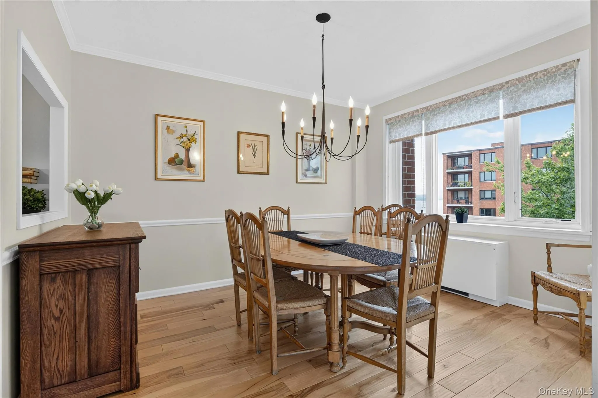 Generous space to host festive gatherings or intimate evenings. Custom design shades and tasteful chandelier included. Generous space to host festive gatherings or intimate evenings. Custom design shades and tasteful chandelier included.