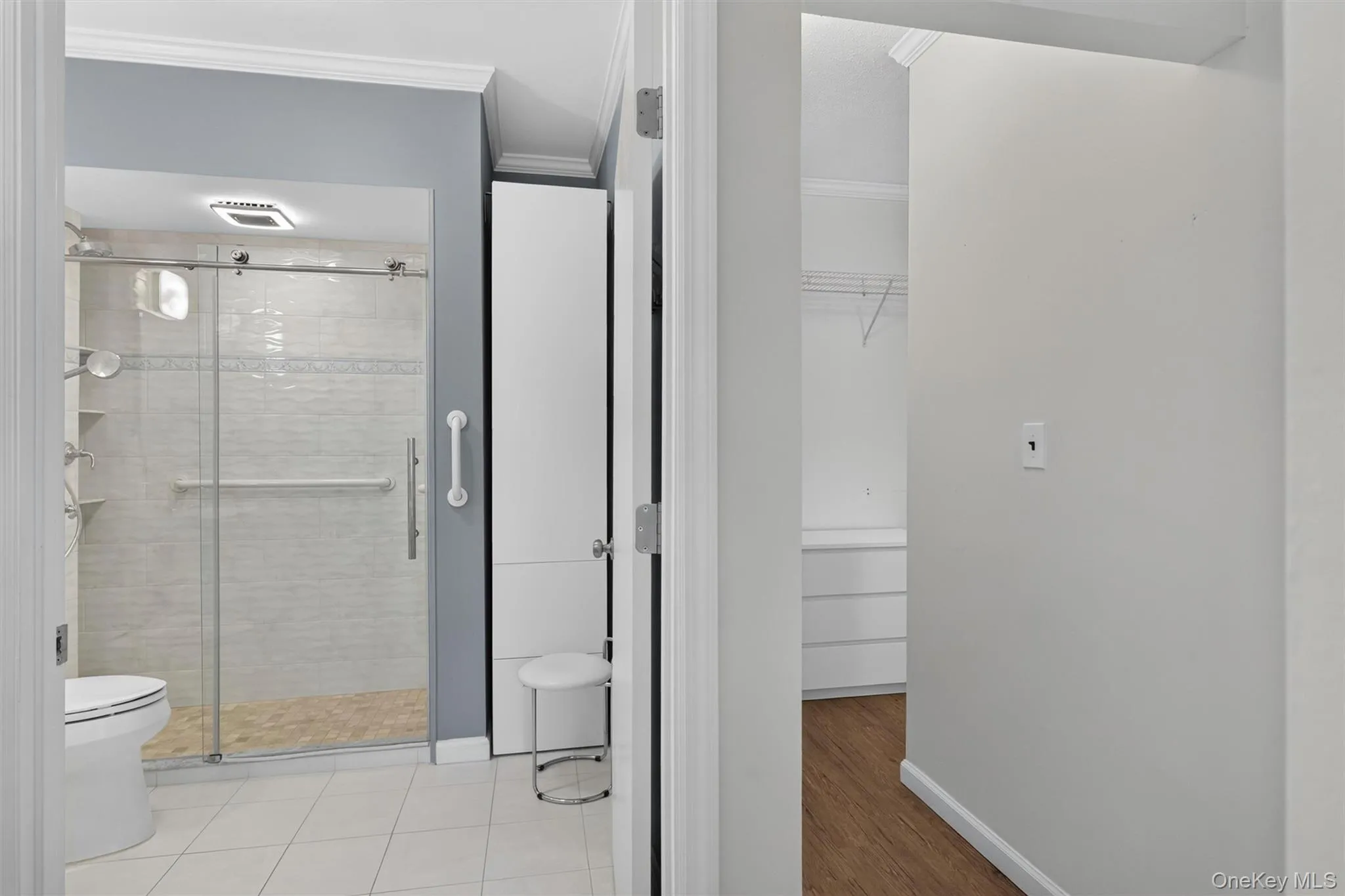 Spacious primary bathroom abuts the walk in closet. Spacious primary bathroom abuts the walk in closet.