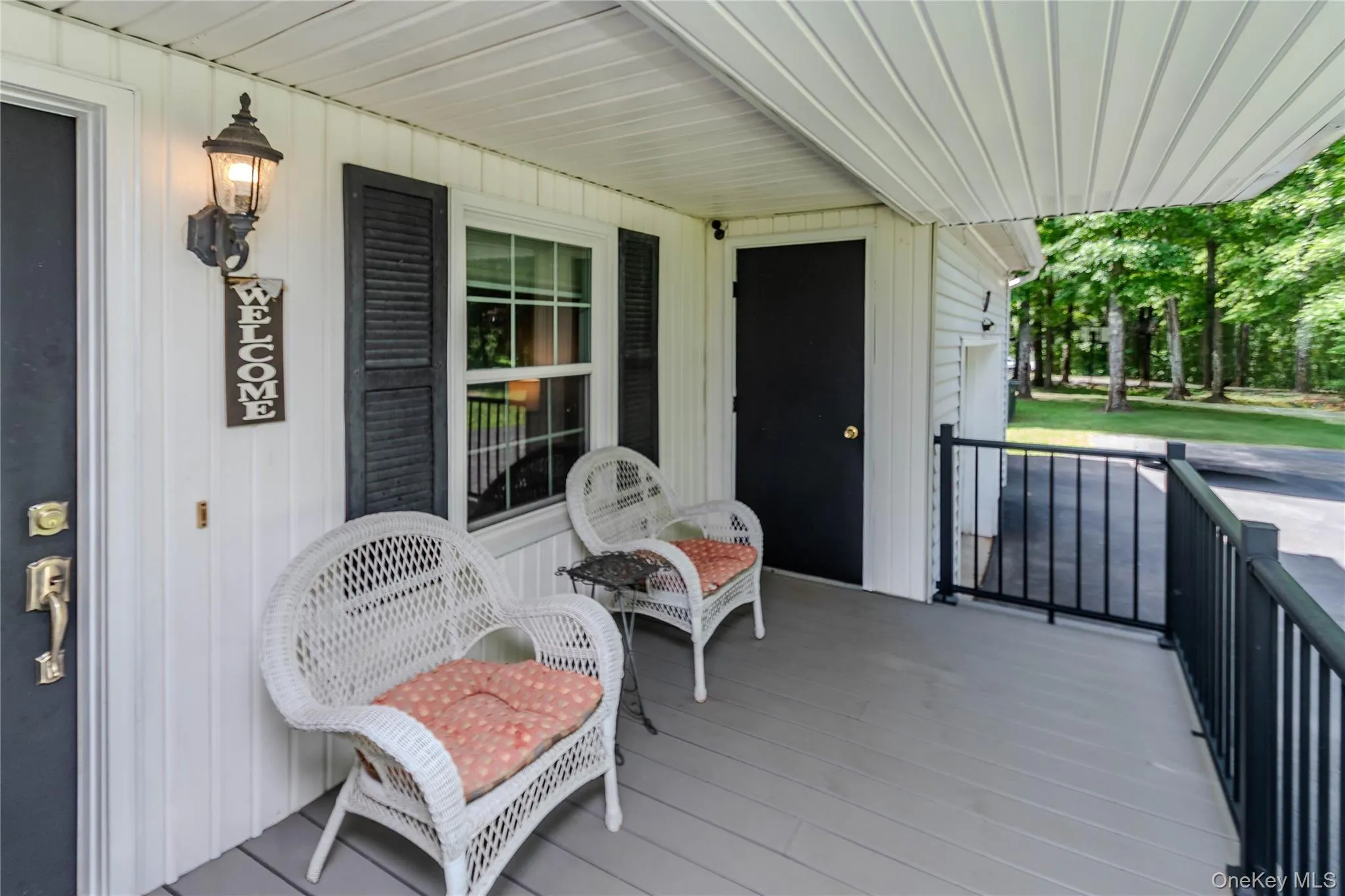 Trex front porch with access to the garage Trex front porch with access to the garage