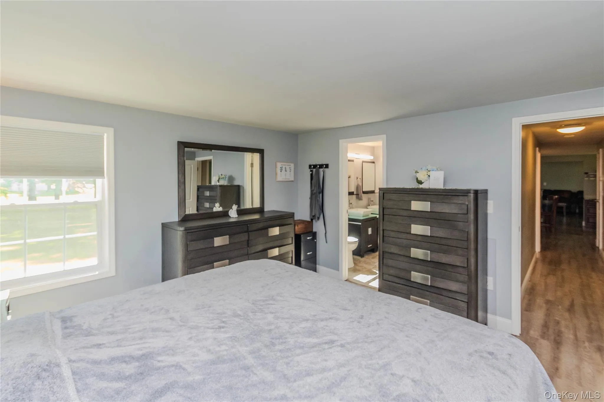 Light gray walls with white trim and a white ceiling Light gray walls with white trim and a white ceiling