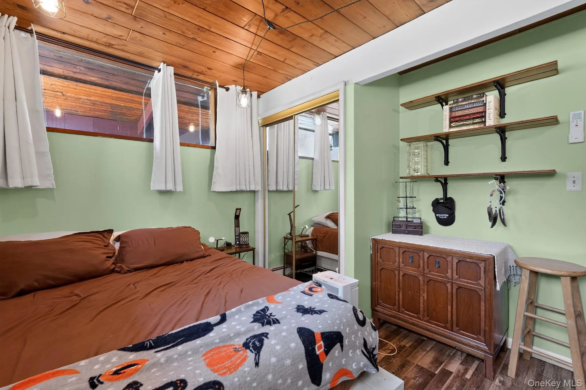 Wood-paneled ceiling with exposed beams Wood-paneled ceiling with exposed beams