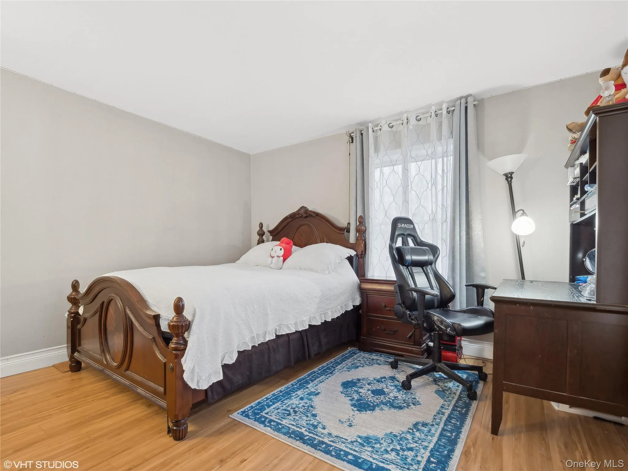 Bedroom featuring light wood-type flooring Bedroom featuring light wood-type flooring