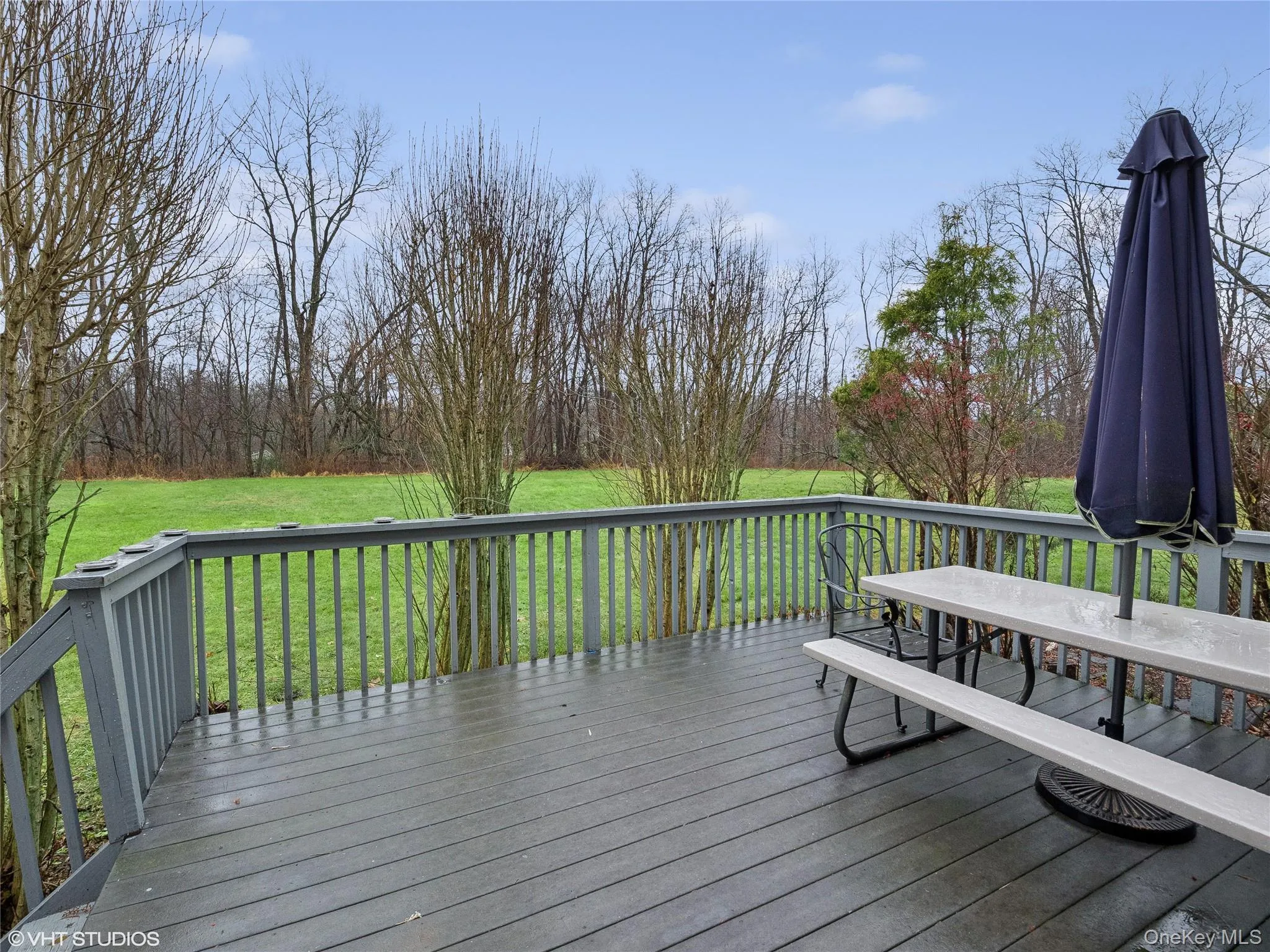 Deck with a yard Deck with a yard