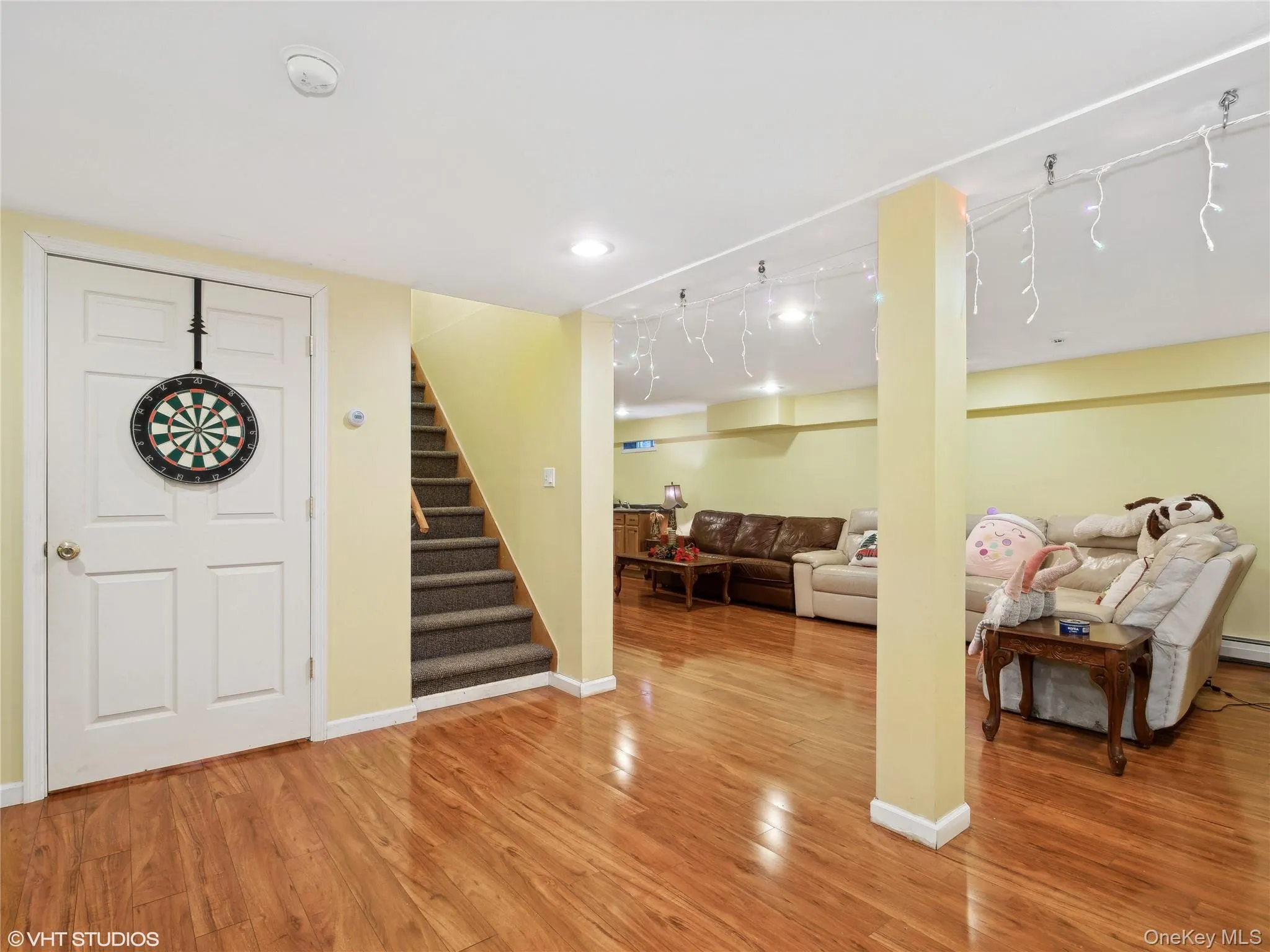 Entrance foyer featuring hardwood / wood-style floors Entrance foyer featuring hardwood / wood-style floors