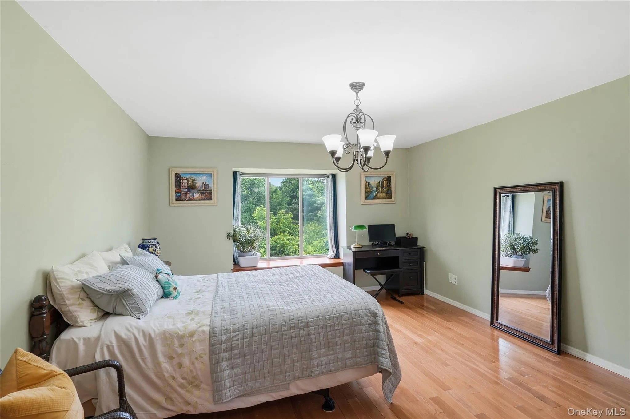 Spacious Primary Bedroom with large window with waterview. Spacious Primary Bedroom with large window with waterview.