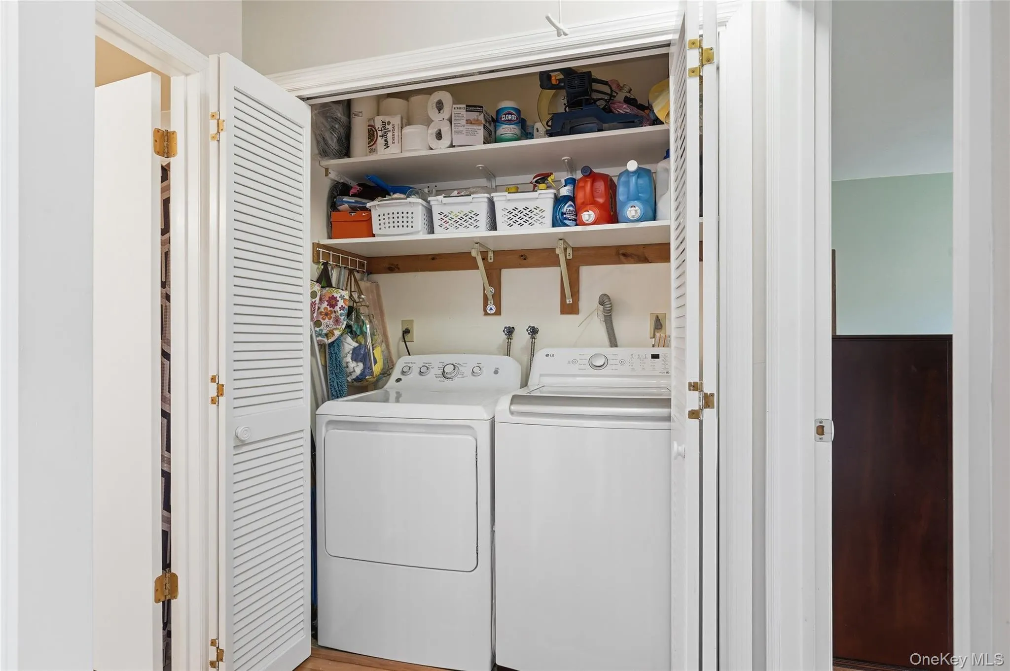 Laundry Closet in hallway with washer/dryer. Laundry Closet in hallway with washer/dryer.