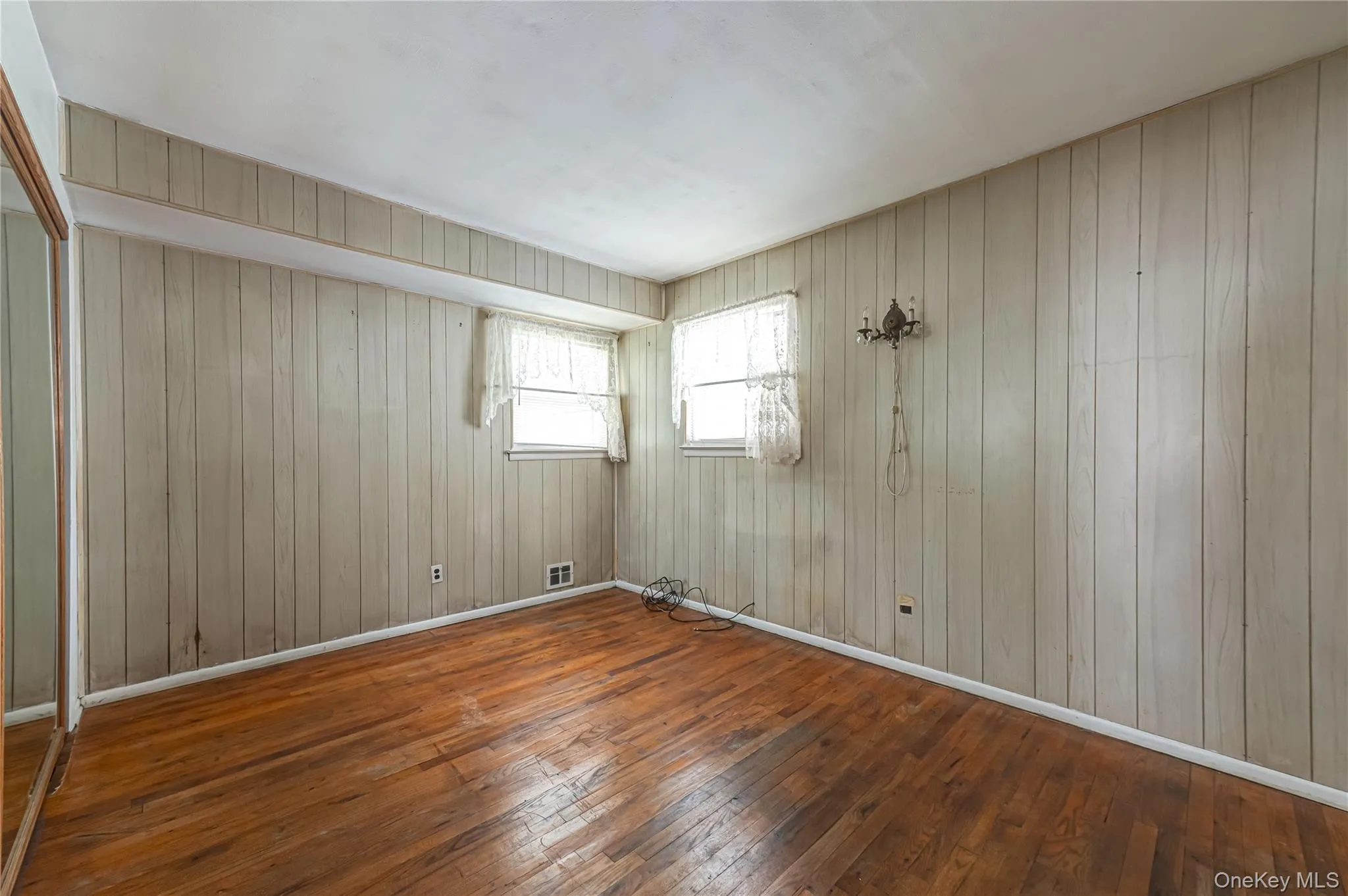 Primary Bedroom with Hardwood Floors Primary Bedroom with Hardwood Floors