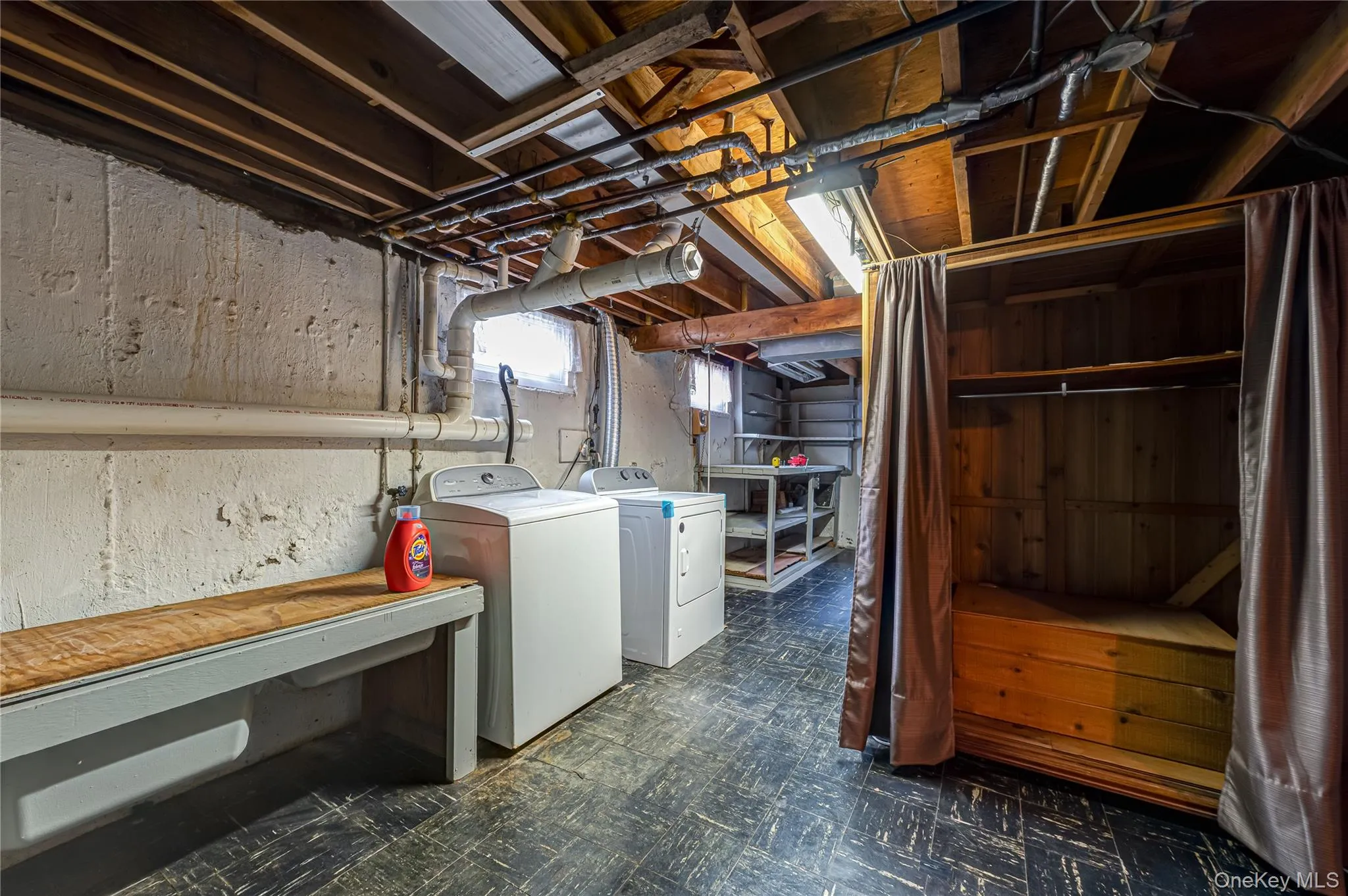 Utility side of Basement. Equipped with Washer & Dryer, Cedar Closet Utility side of Basement. Equipped with Washer & Dryer, Cedar Closet