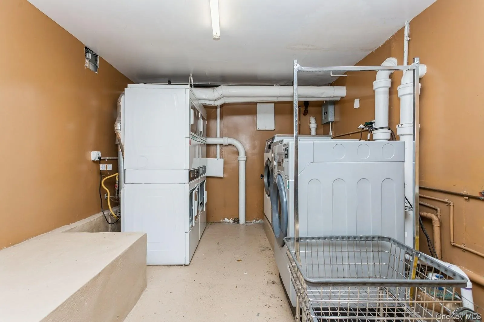 Washroom featuring washer and clothes dryer Washroom featuring washer and clothes dryer