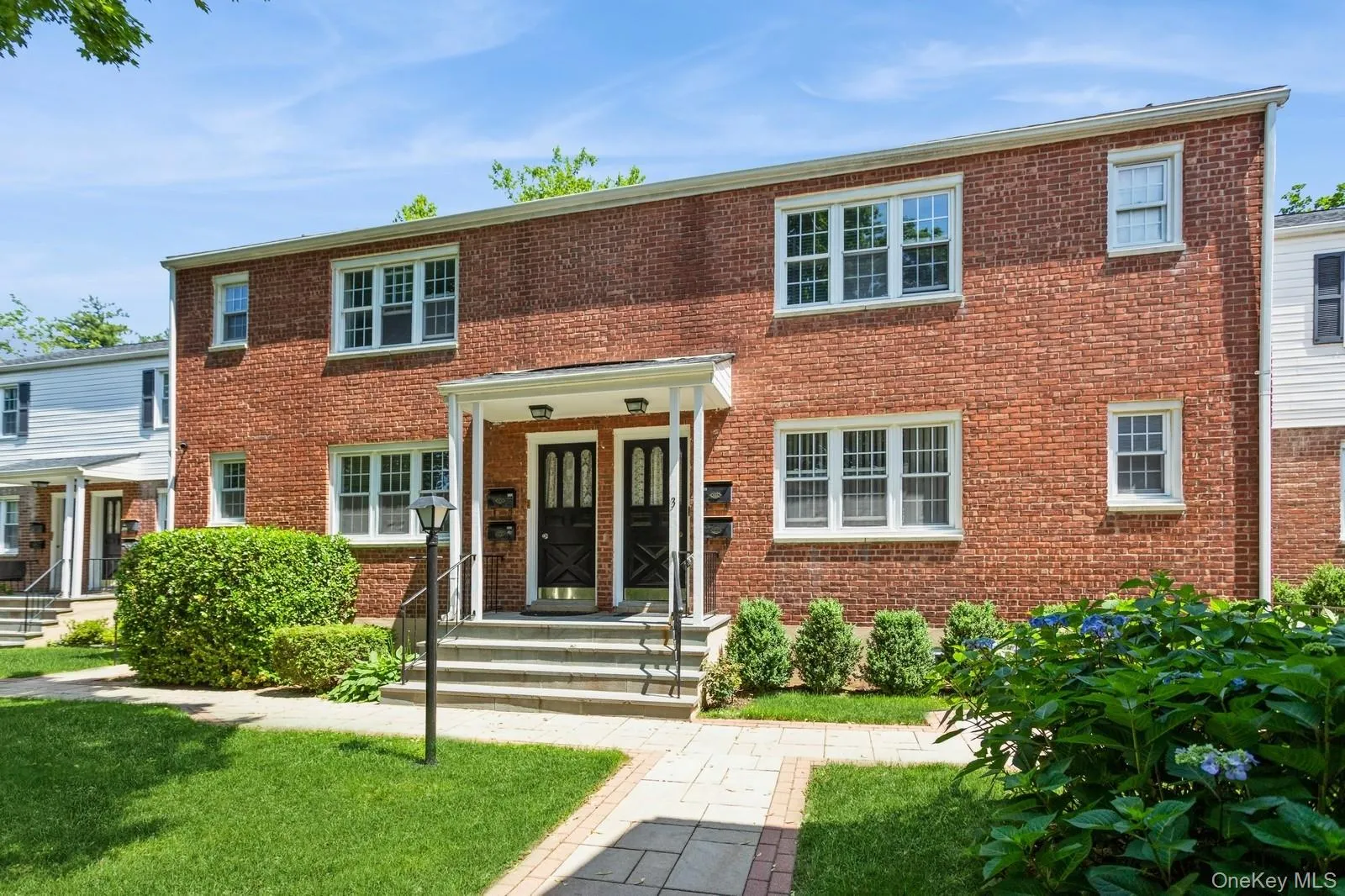 Multi unit property with brick siding Multi unit property with brick siding