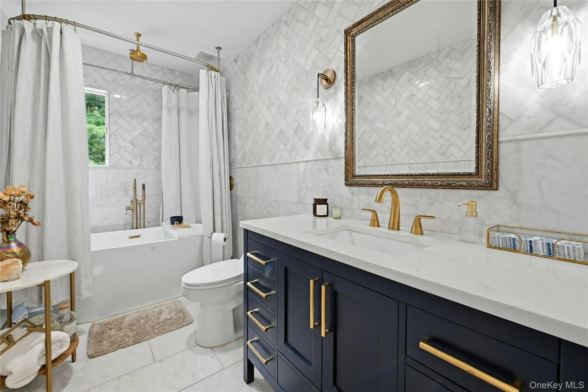 Full bathroom on 1st floor with soaking tub and shower Full bathroom on 1st floor with soaking tub and shower