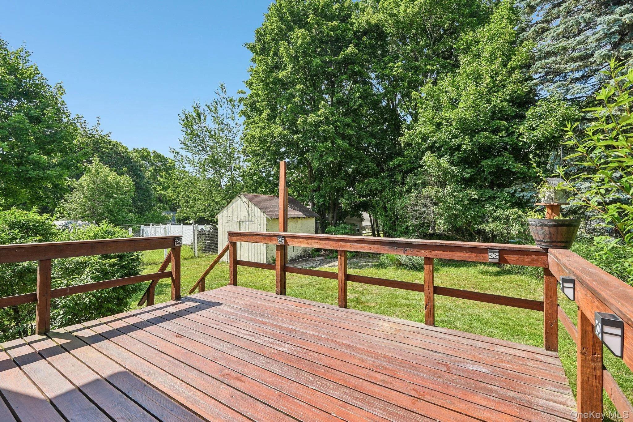 Private deck overlooking the yard. Private deck overlooking the yard.