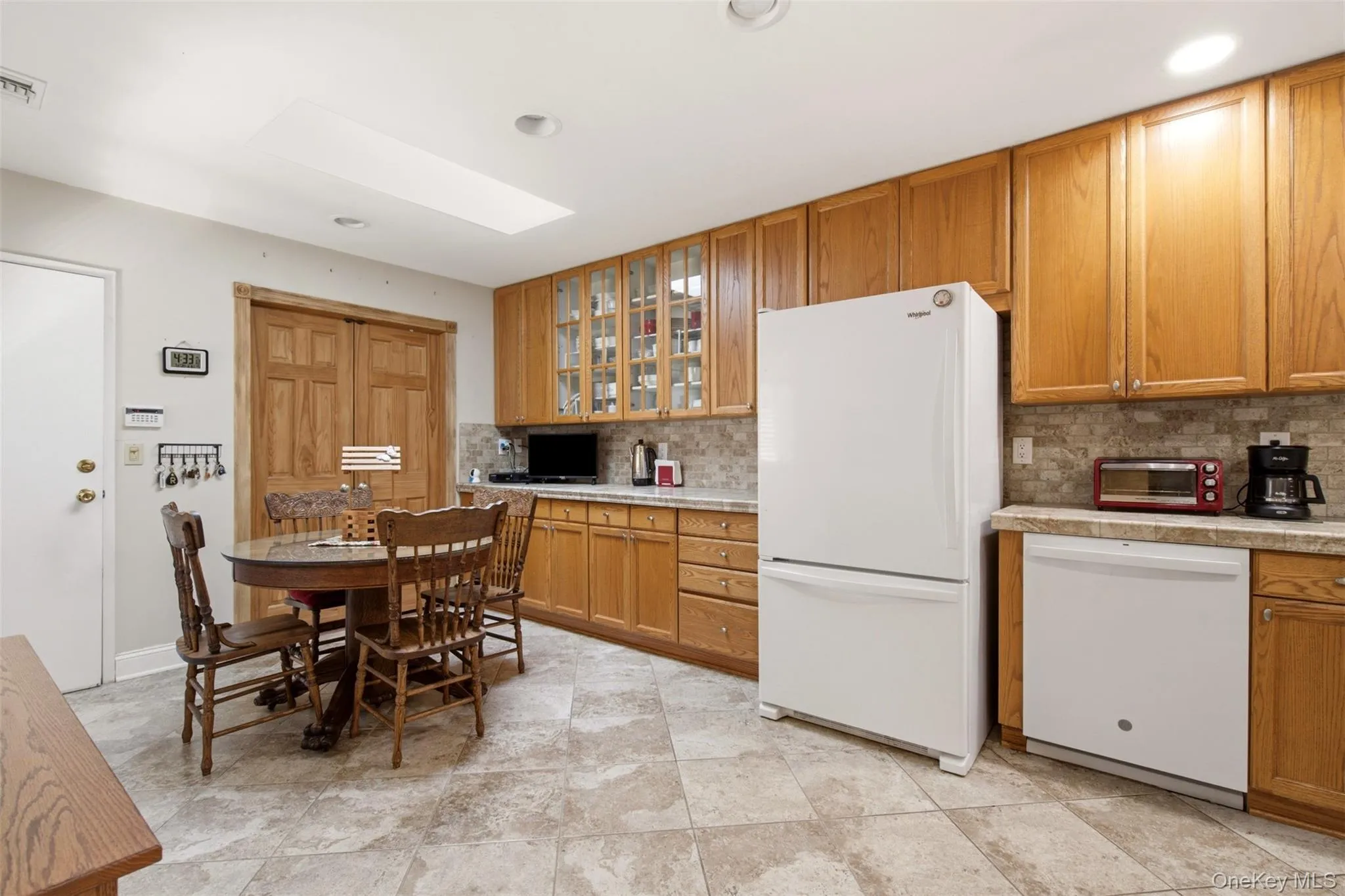 Eat in kitchen with newer appliances and entrance to garage. Eat in kitchen with newer appliances and entrance to garage.