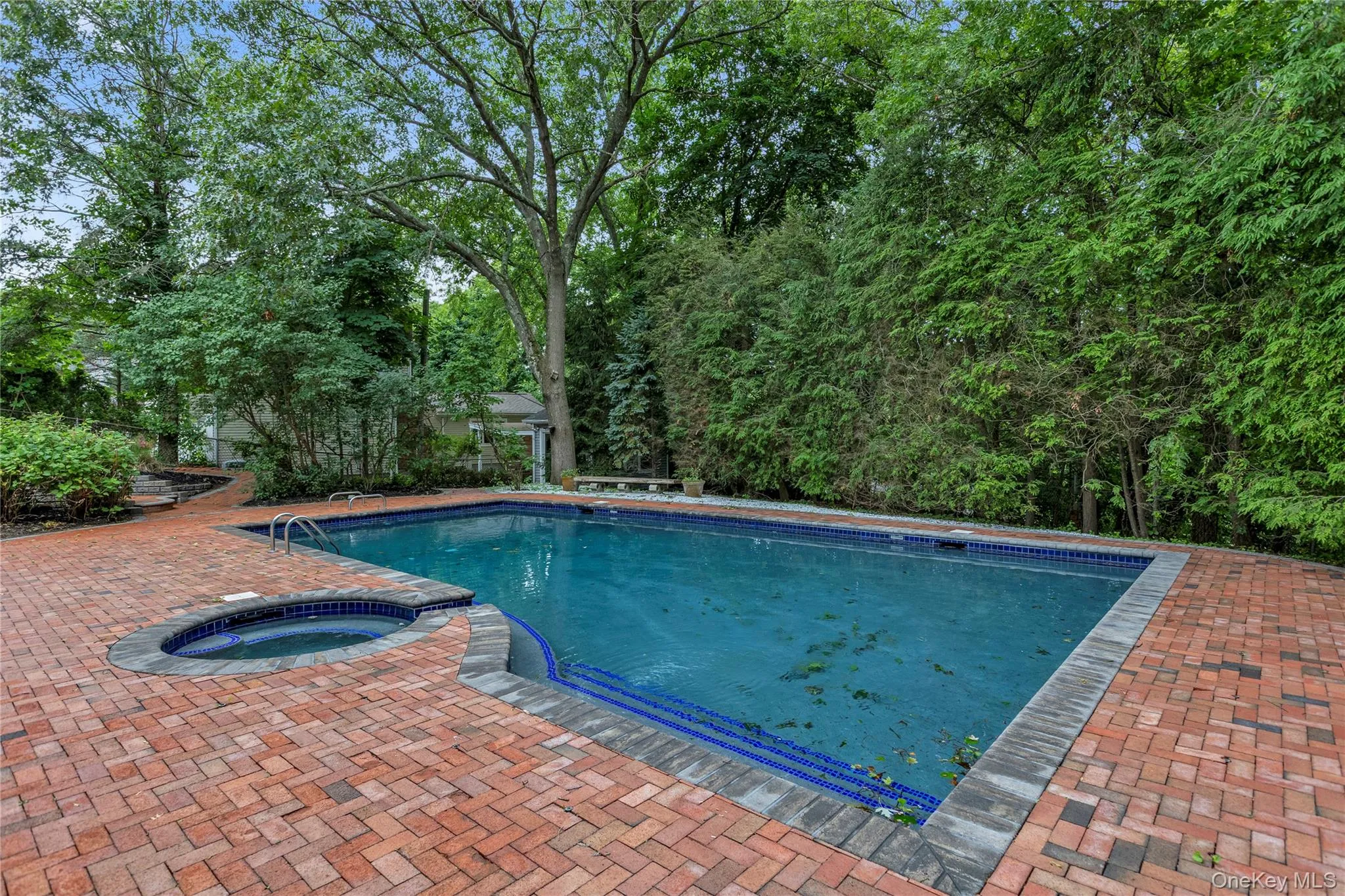 Gunite solar heated pool with spa. Gunite solar heated pool with spa.