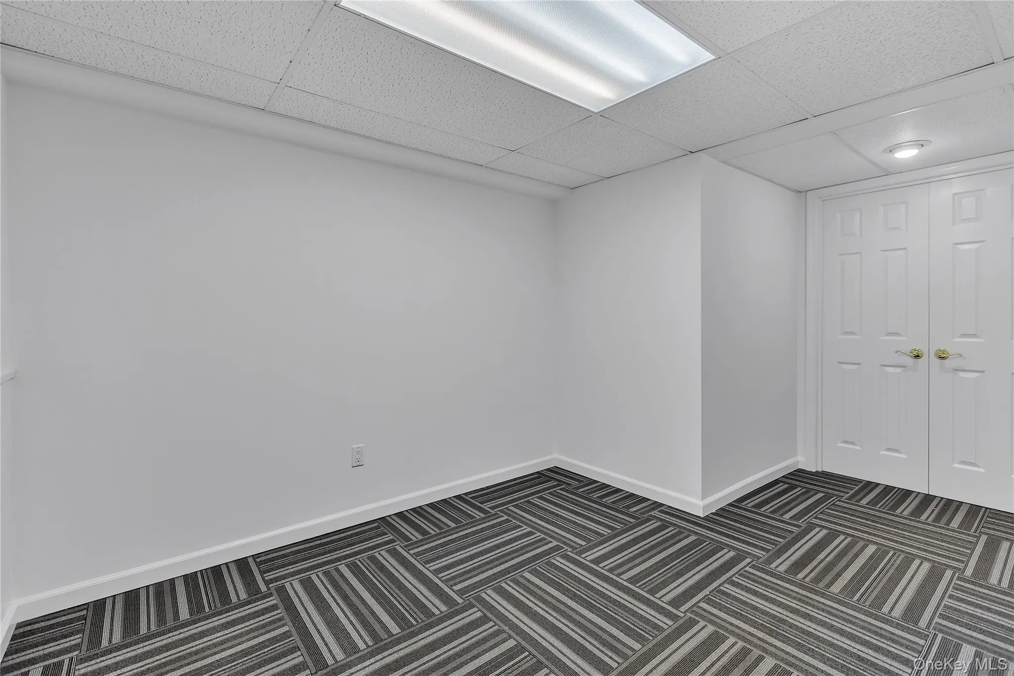 Access to unfinished basement. Access to unfinished basement.