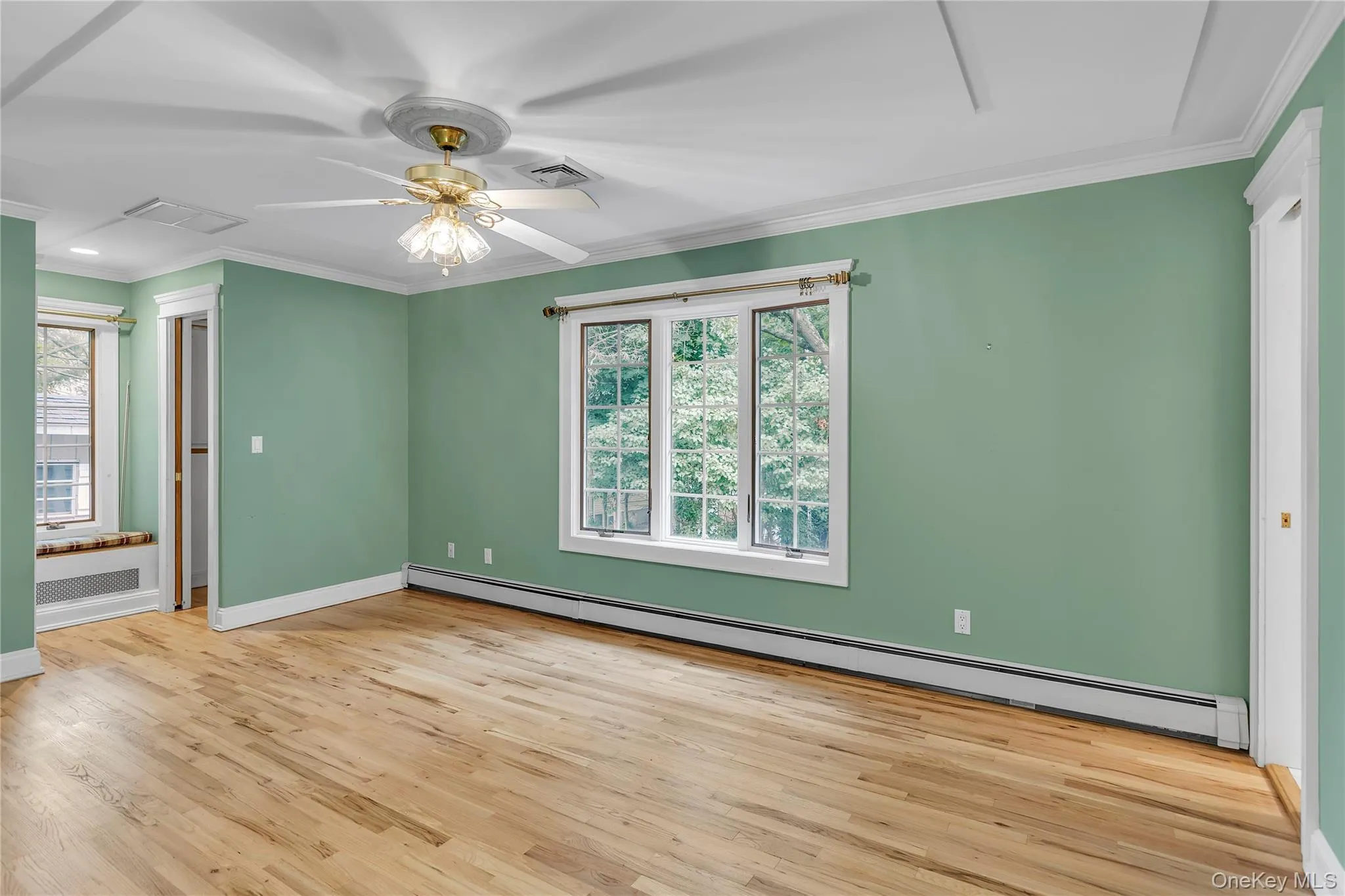Two Walk-In closets and window bench seat. Access to primary bathroom. Two Walk-In closets and window bench seat. Access to primary bathroom.