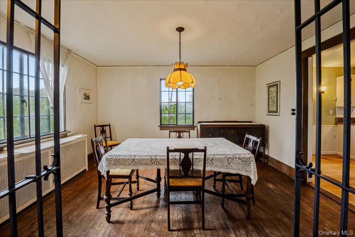 Dining room off living room with hardwood floors Dining room off living room with hardwood floors