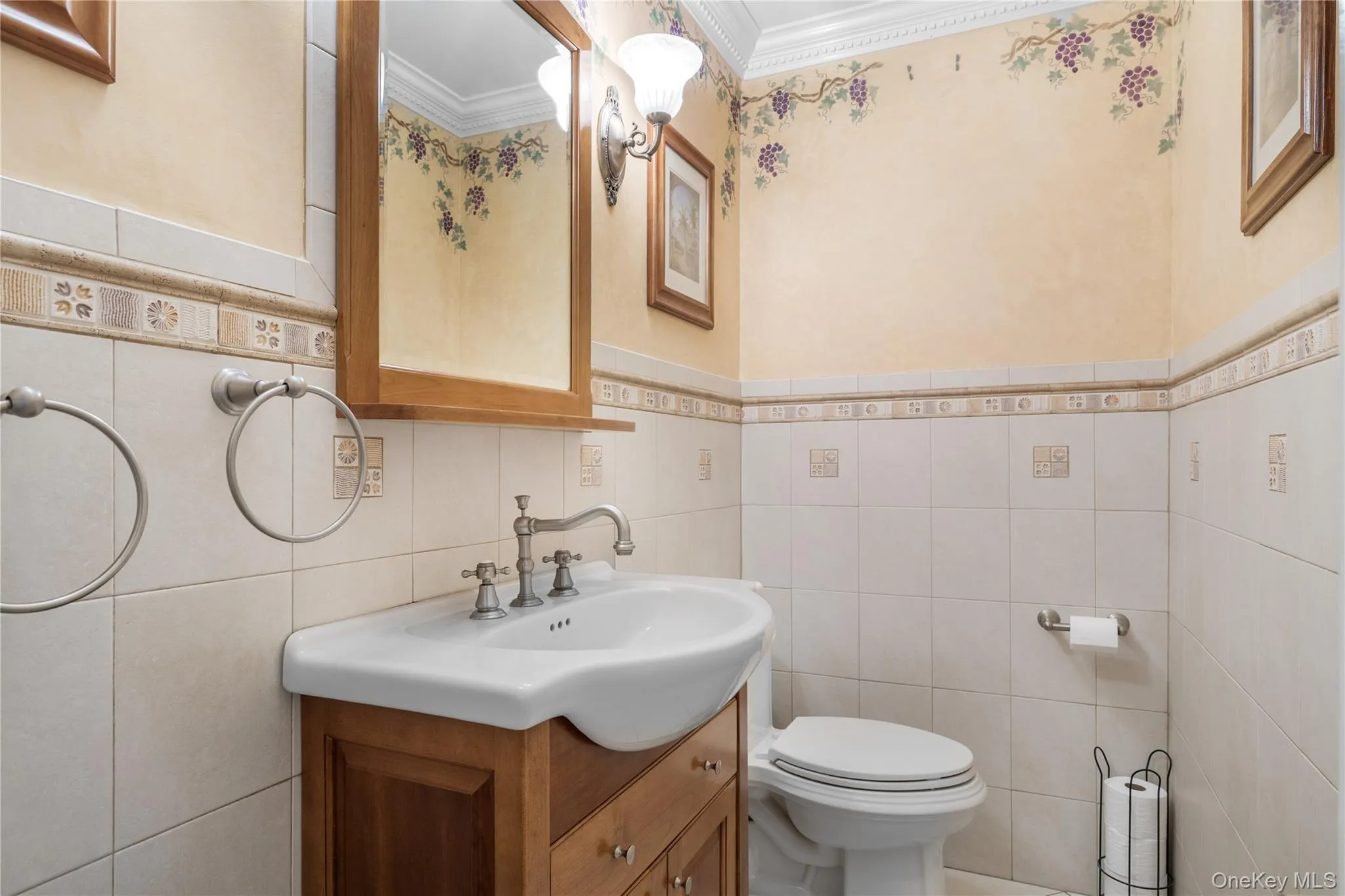 Bathroom vanity with an integrated sink and base cabinetry, featuring a wall-mounted mirror Bathroom vanity with an integrated sink and base cabinetry, featuring a wall-mounted mirror