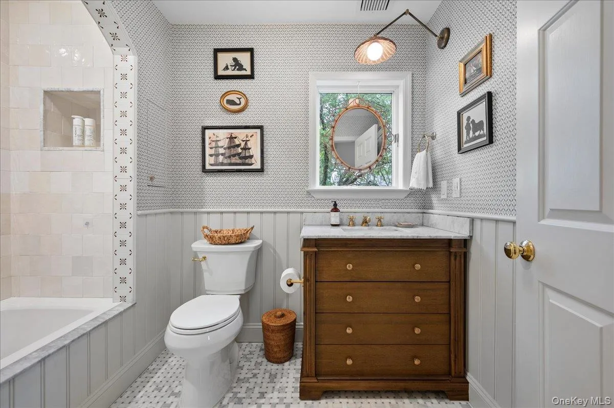 Hall bathroom with built in linen closet Hall bathroom with built in linen closet