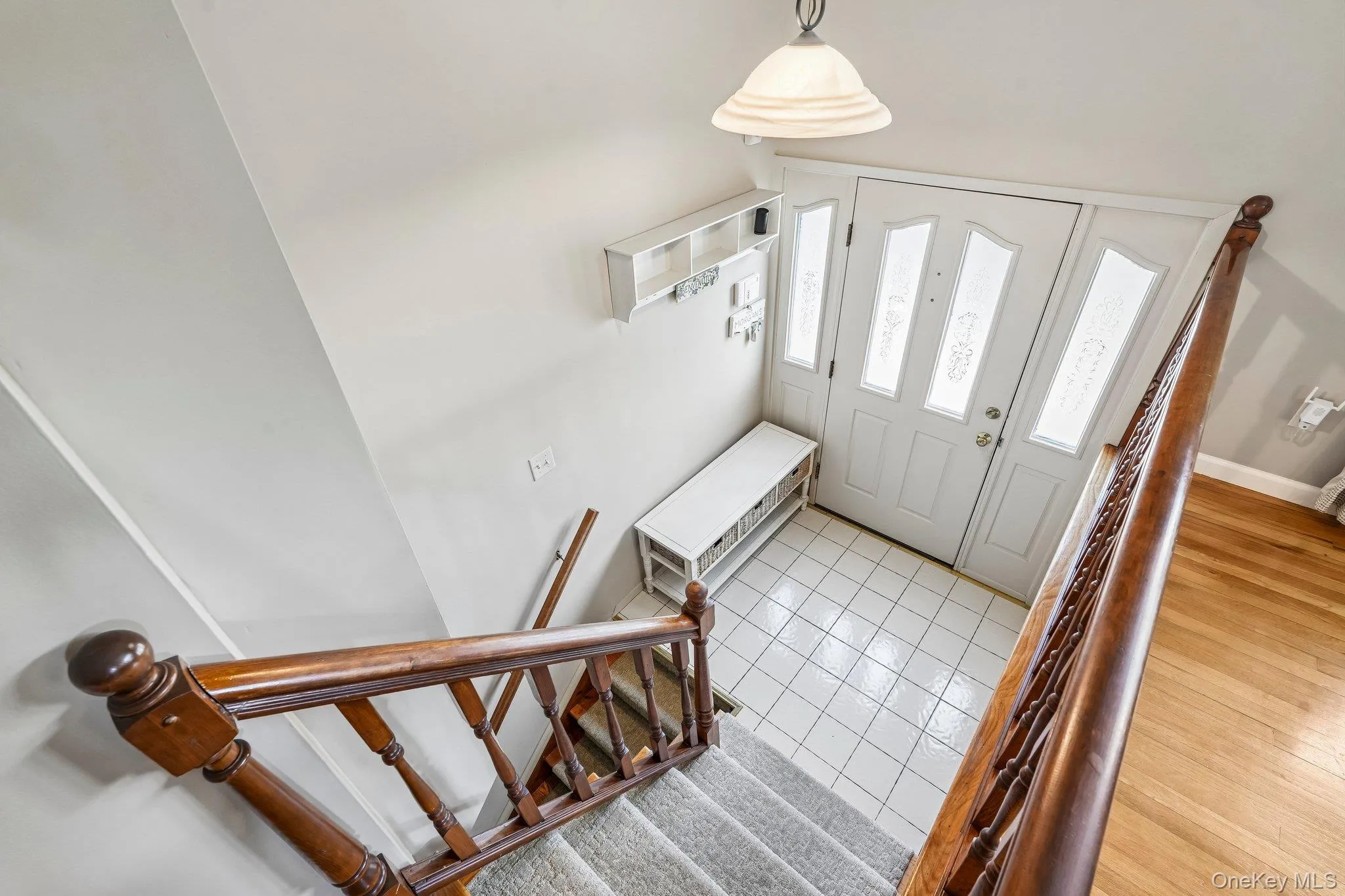 Foyer entrance featuring a white panel door Foyer entrance featuring a white panel door
