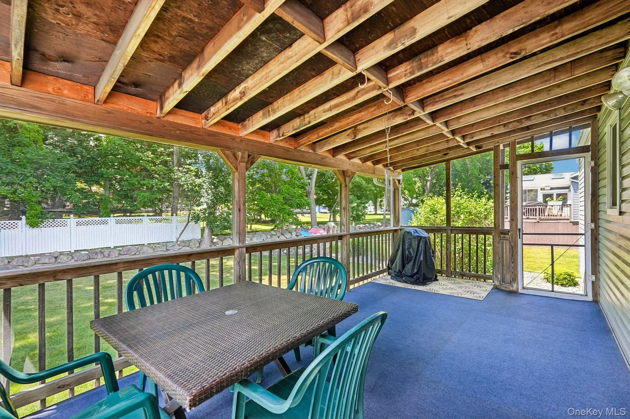 Screened in 3 season deck. Screened in 3 season deck.