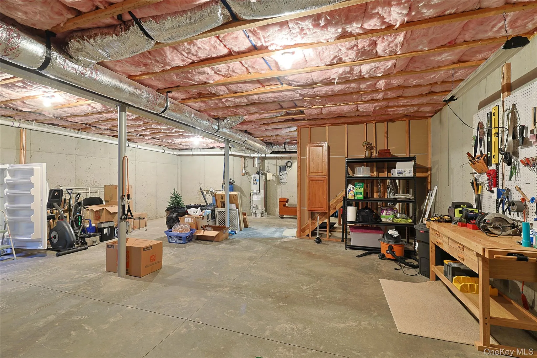 basement with plenty of storage and work area basement with plenty of storage and work area