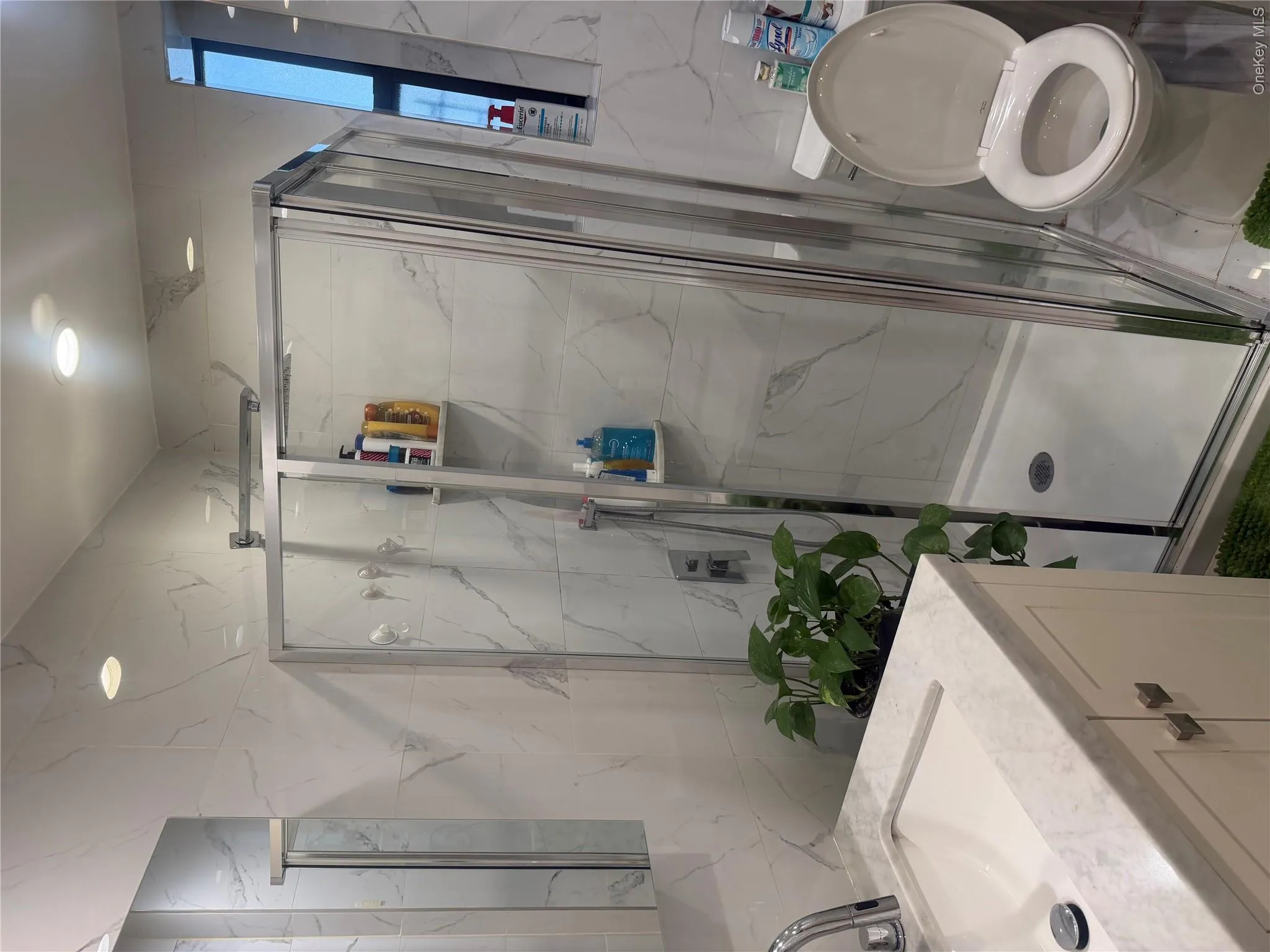 Granite sink & marble tile walls. Granite sink & marble tile walls.