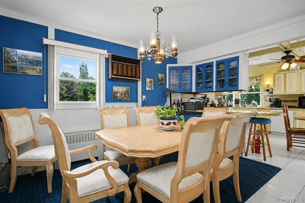 Dining Room is open to both the Kitchen & Living Room for easy entertaining Dining Room is open to both the Kitchen & Living Room for easy entertaining