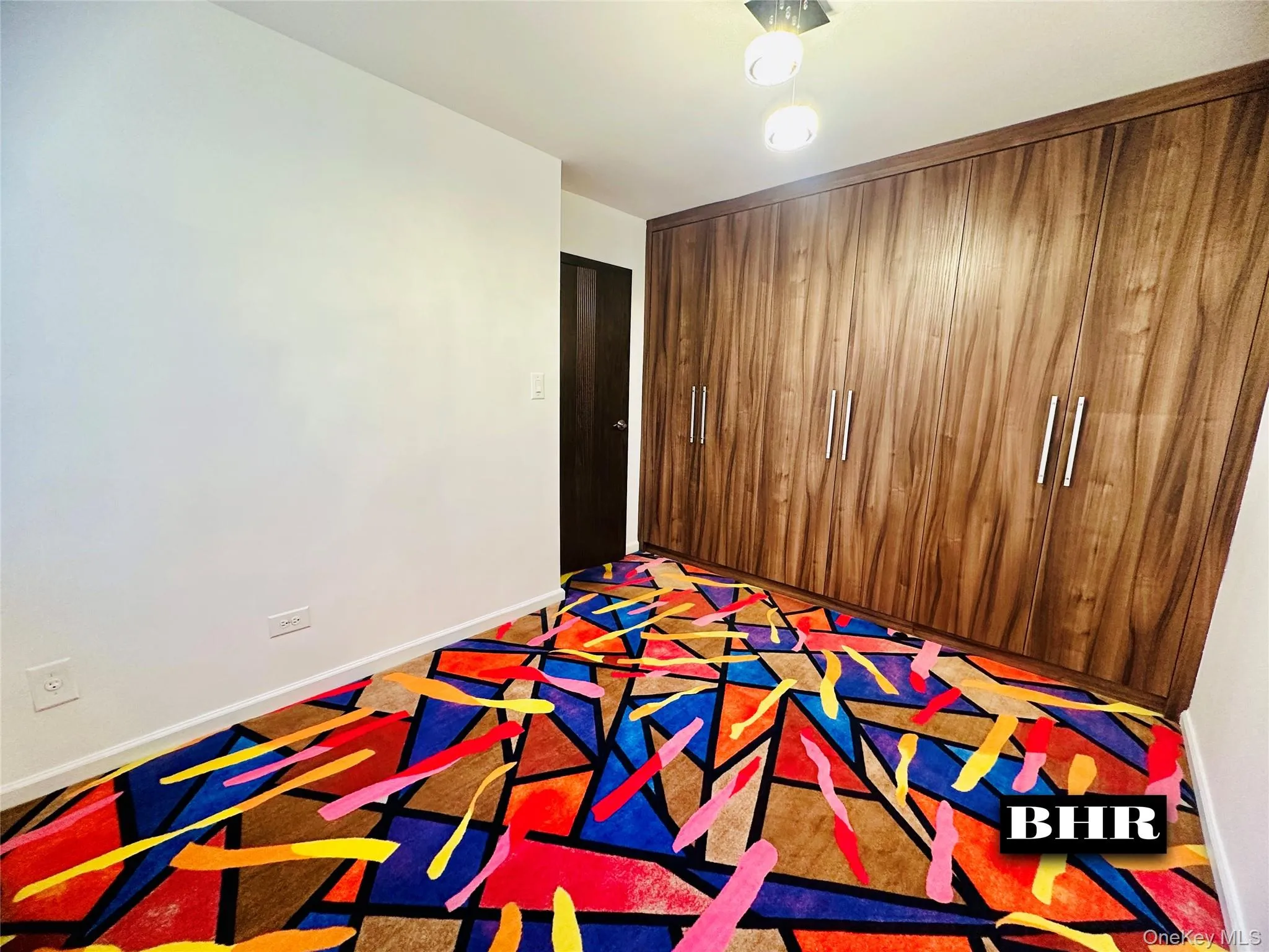 Unfurnished bedroom with baseboards Unfurnished bedroom with baseboards