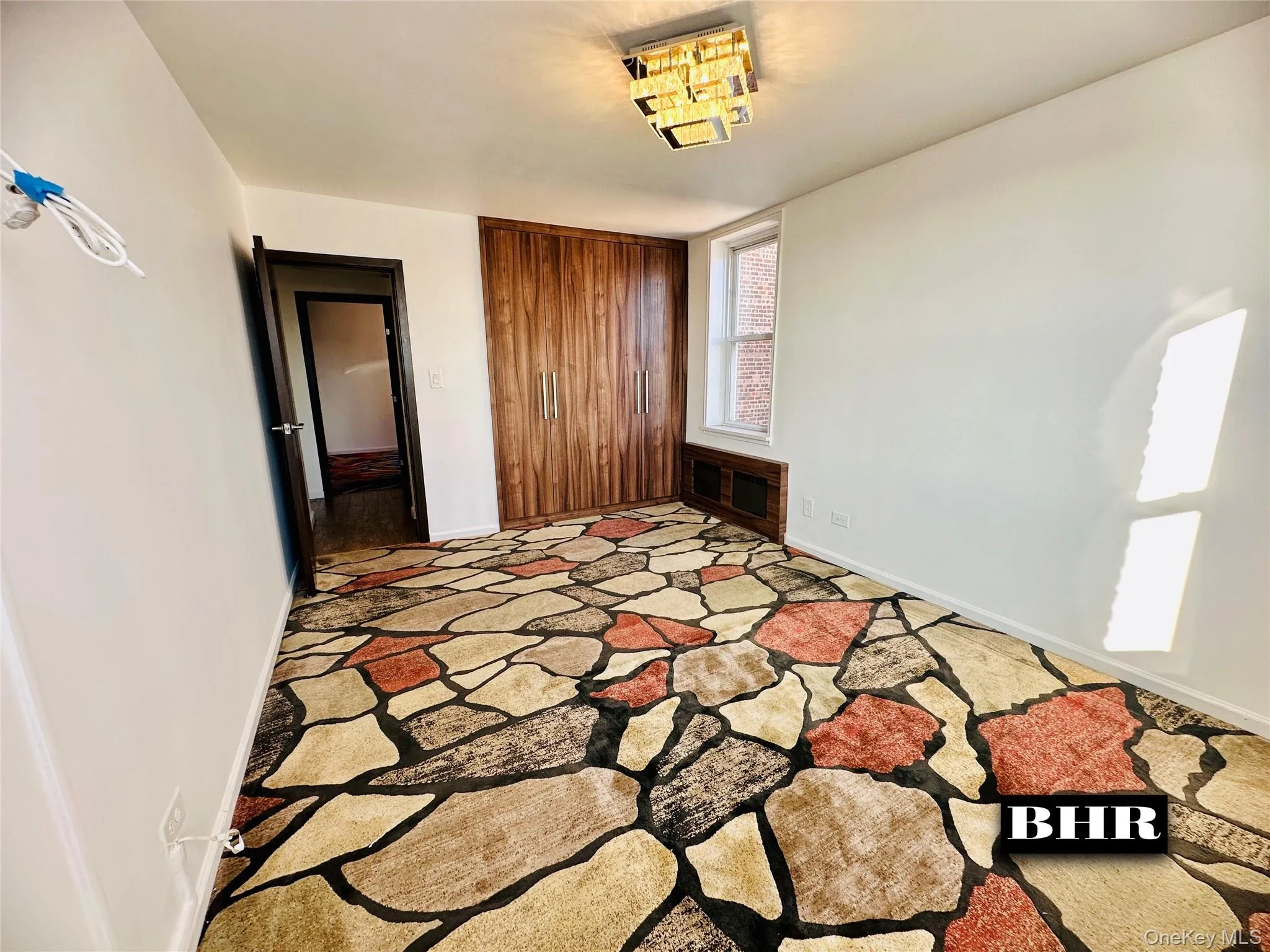 Unfurnished bedroom featuring baseboards Unfurnished bedroom featuring baseboards