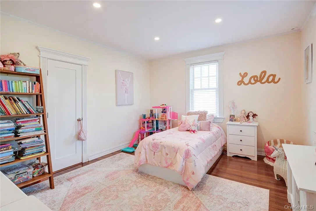 Bedroom with hardwood floors and recessed lighting Bedroom with hardwood floors and recessed lighting