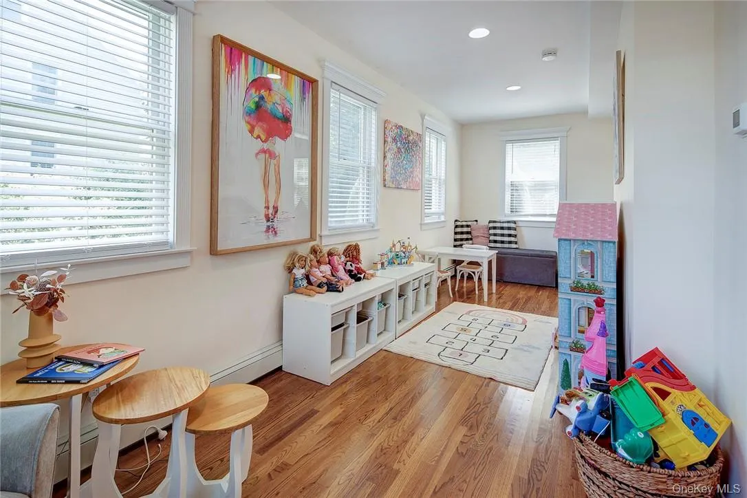 Rec room/Sun Rm with light hardwood floors Rec room/Sun Rm with light hardwood floors