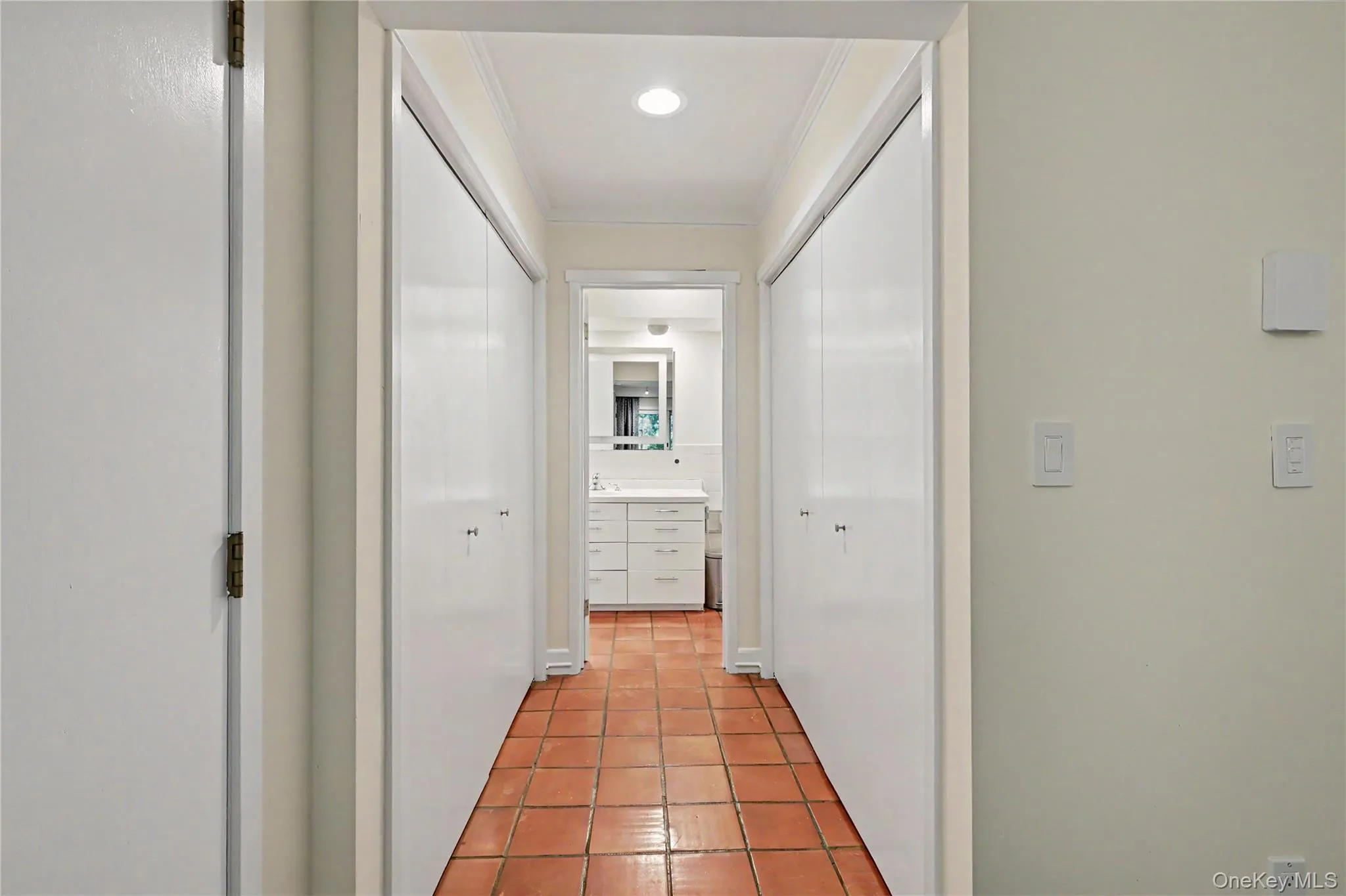 Primary bedroom closet area. Primary bedroom closet area.