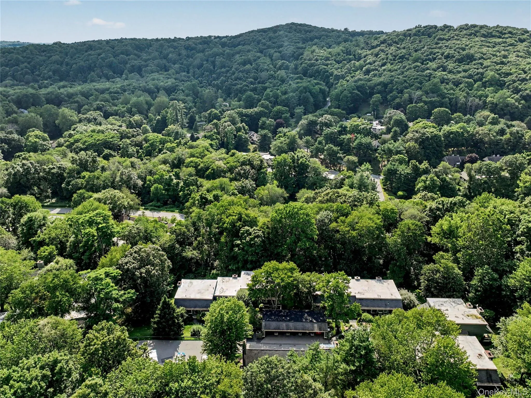 This unit backs to woods offering plenty of privacy. This unit backs to woods offering plenty of privacy.