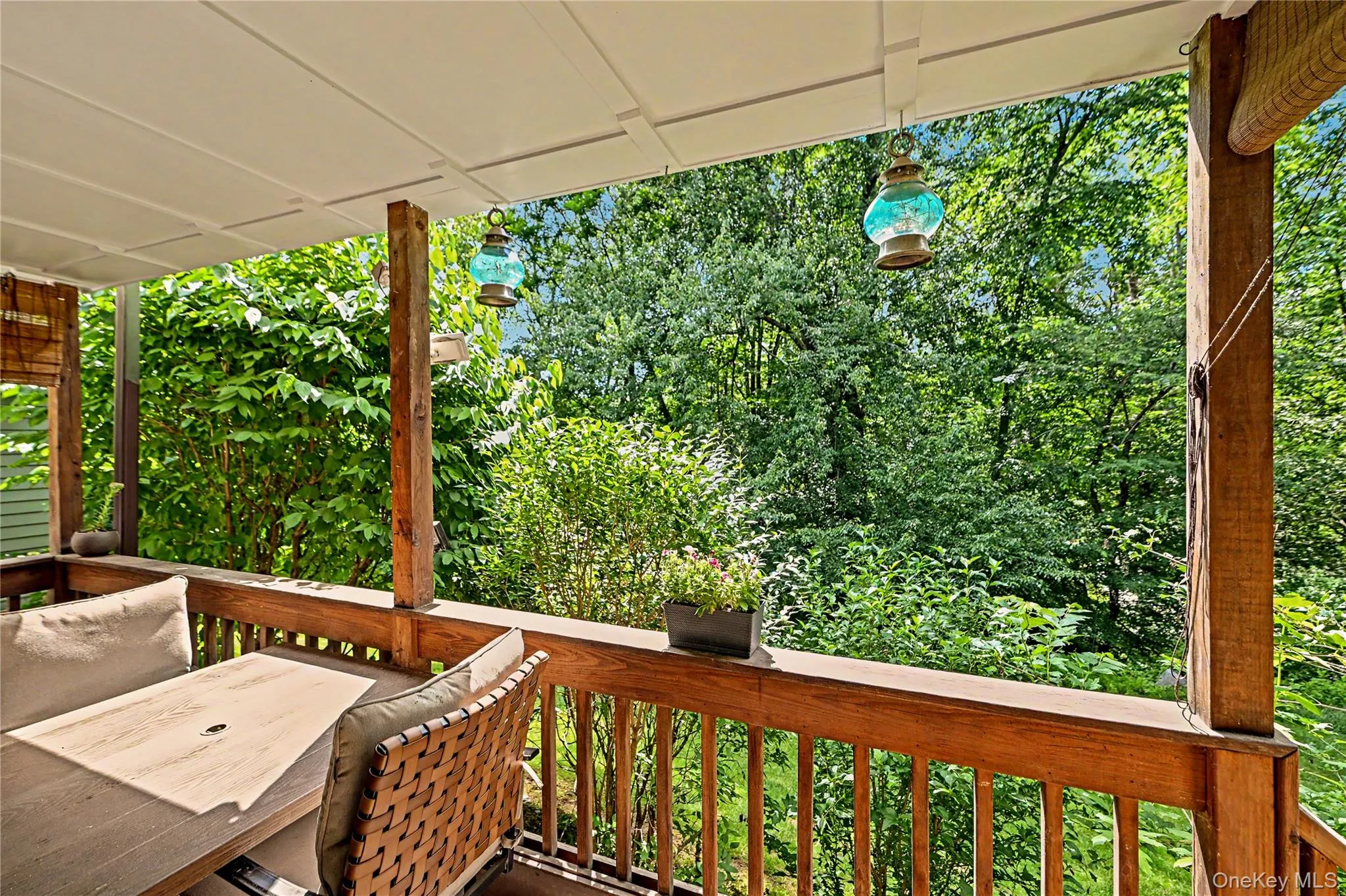 Primary bedroom deck overlooking the lush wooded backyard. Primary bedroom deck overlooking the lush wooded backyard.