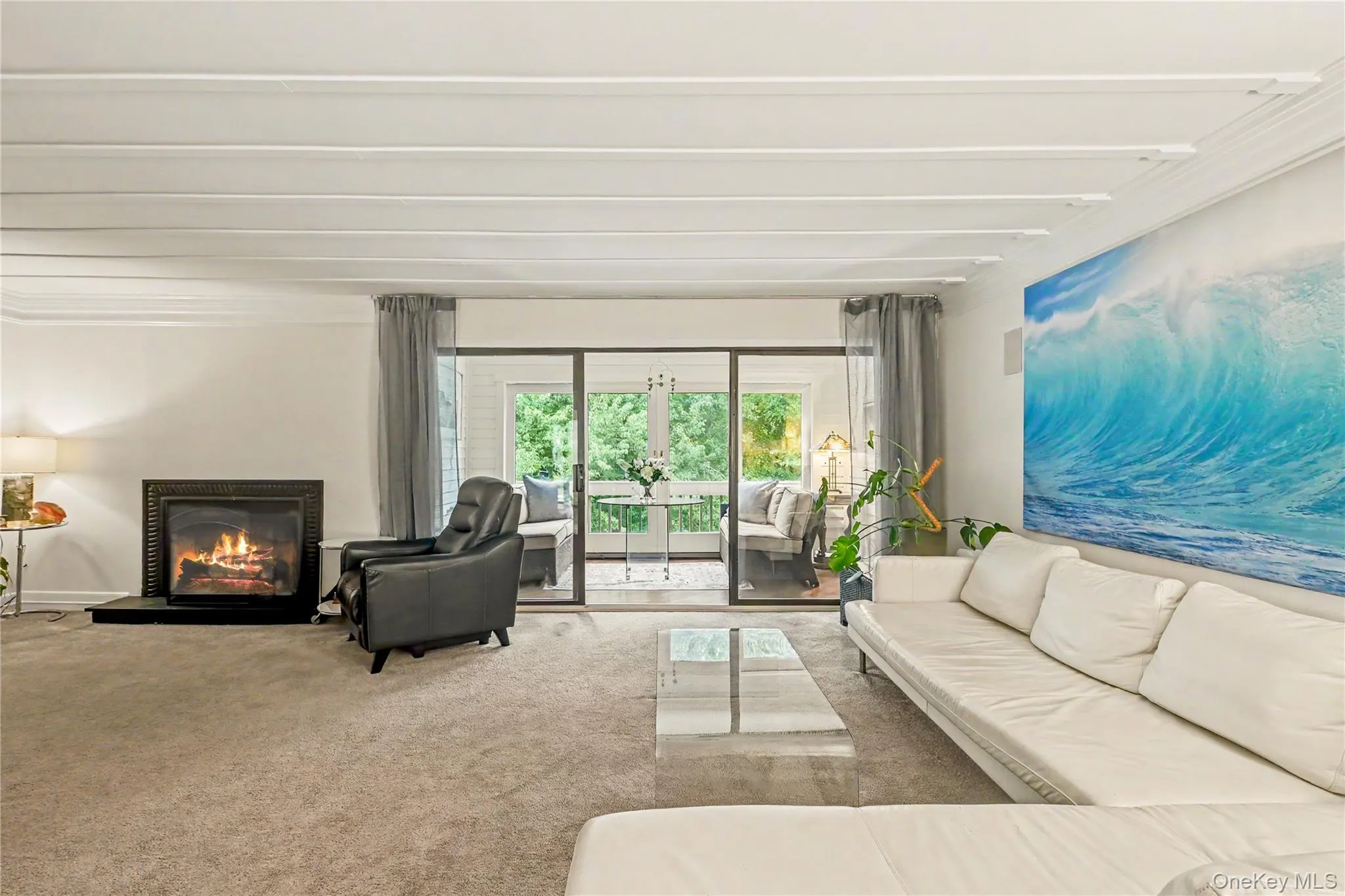 Open concept with view through the three-season enclosed porch. Open concept with view through the three-season enclosed porch.