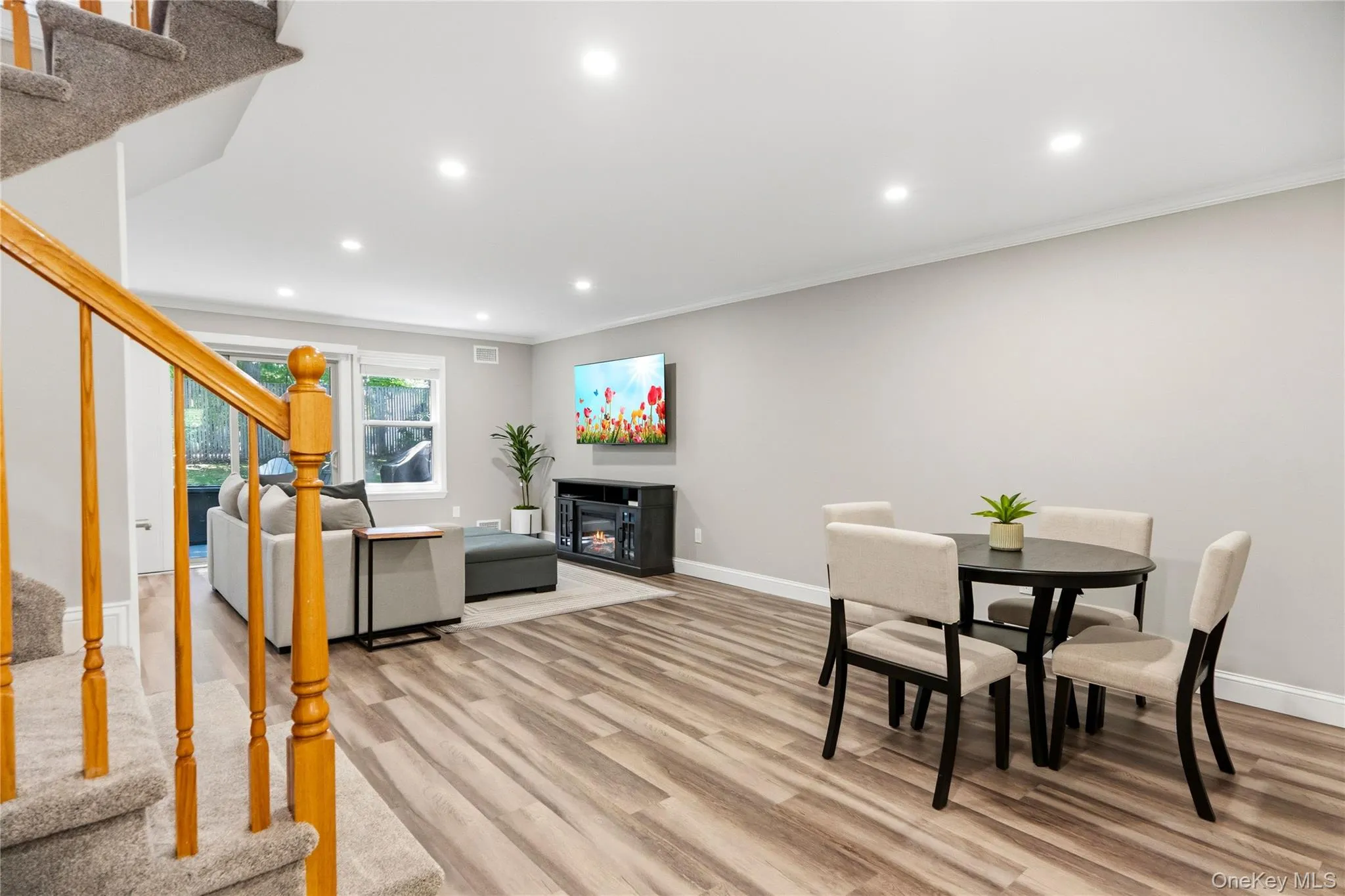 Open floor plan dining and living rooms Open floor plan dining and living rooms