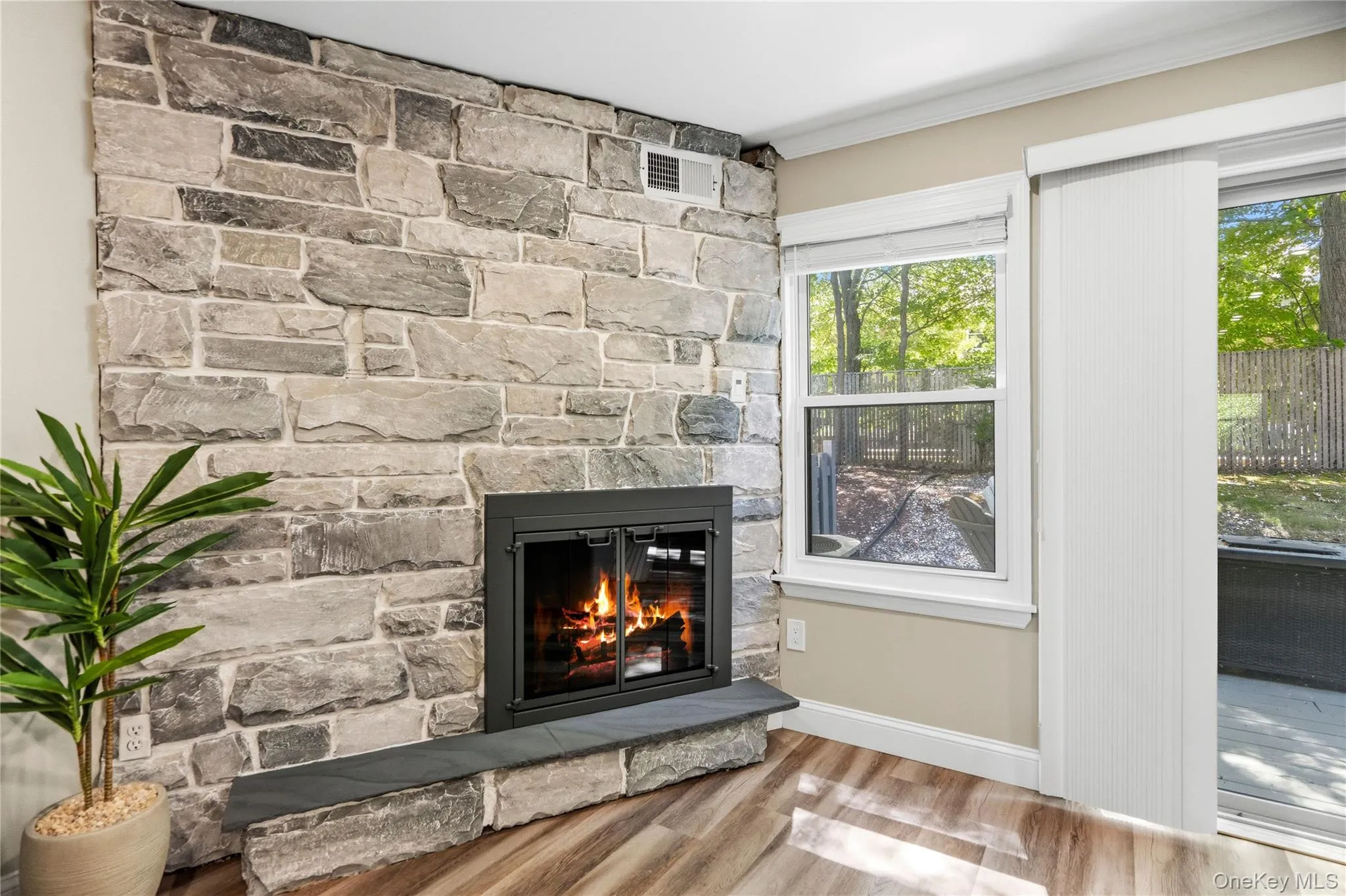 Beautiful stone wood burning fireplace Beautiful stone wood burning fireplace