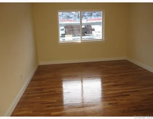 The second bedroom is spacious and has an oversized double closet The second bedroom is spacious and has an oversized double closet