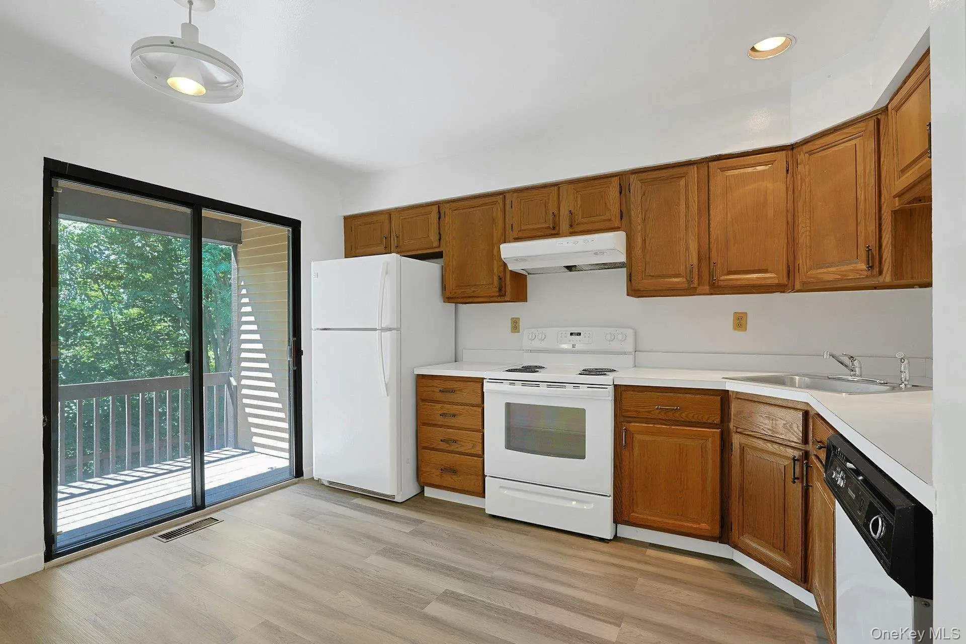 Well designed and efficiently laid out, the eat-in kitchen has good counter and cabinet space, as well as a pass through to the dining room. Well designed and efficiently laid out, the eat-in kitchen has good counter and cabinet space, as well as a pass through to the dining room.