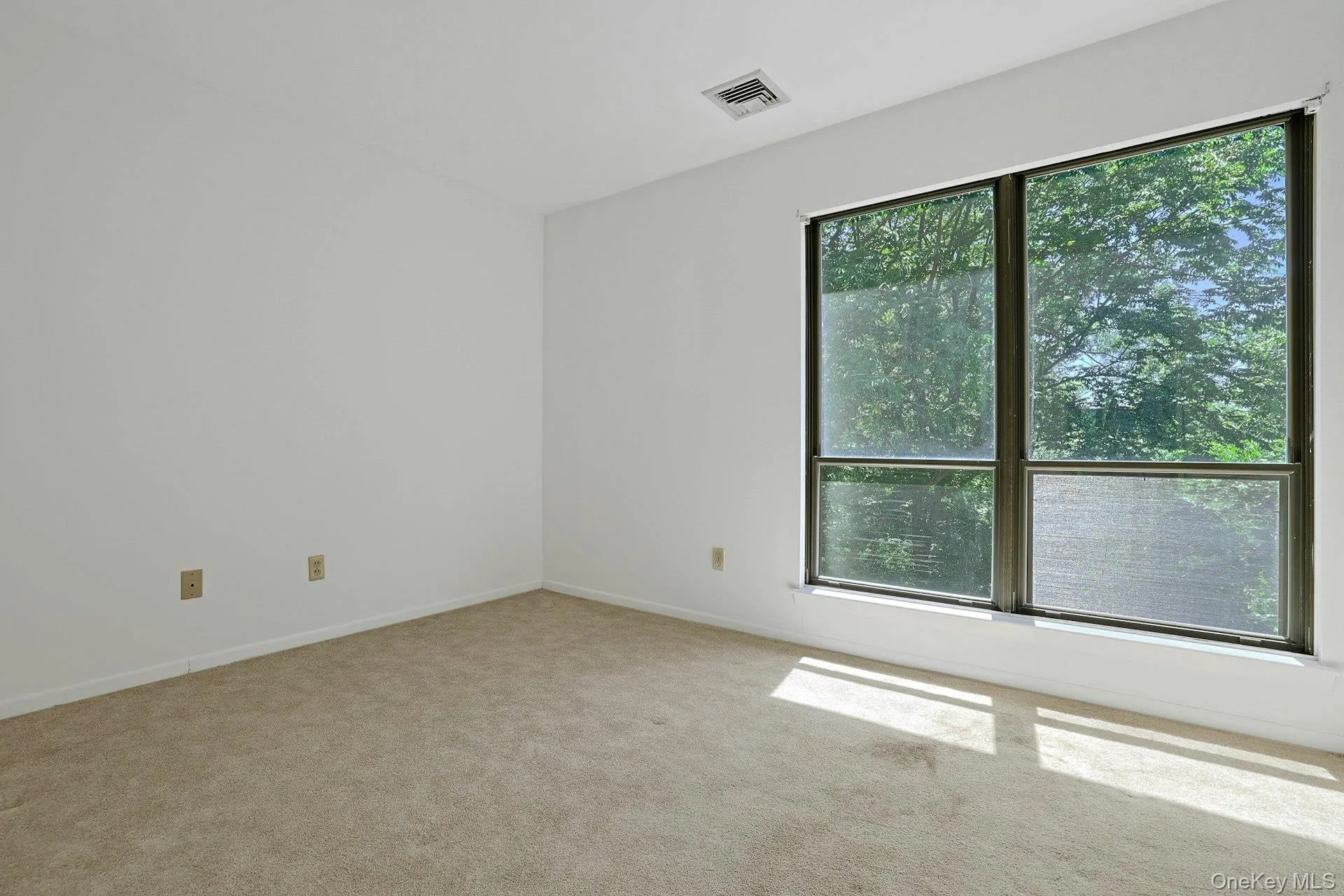 The third bedroom, like the other two, has oversized windows that bring in light and allow for a great cross breeze. The third bedroom, like the other two, has oversized windows that bring in light and allow for a great cross breeze.