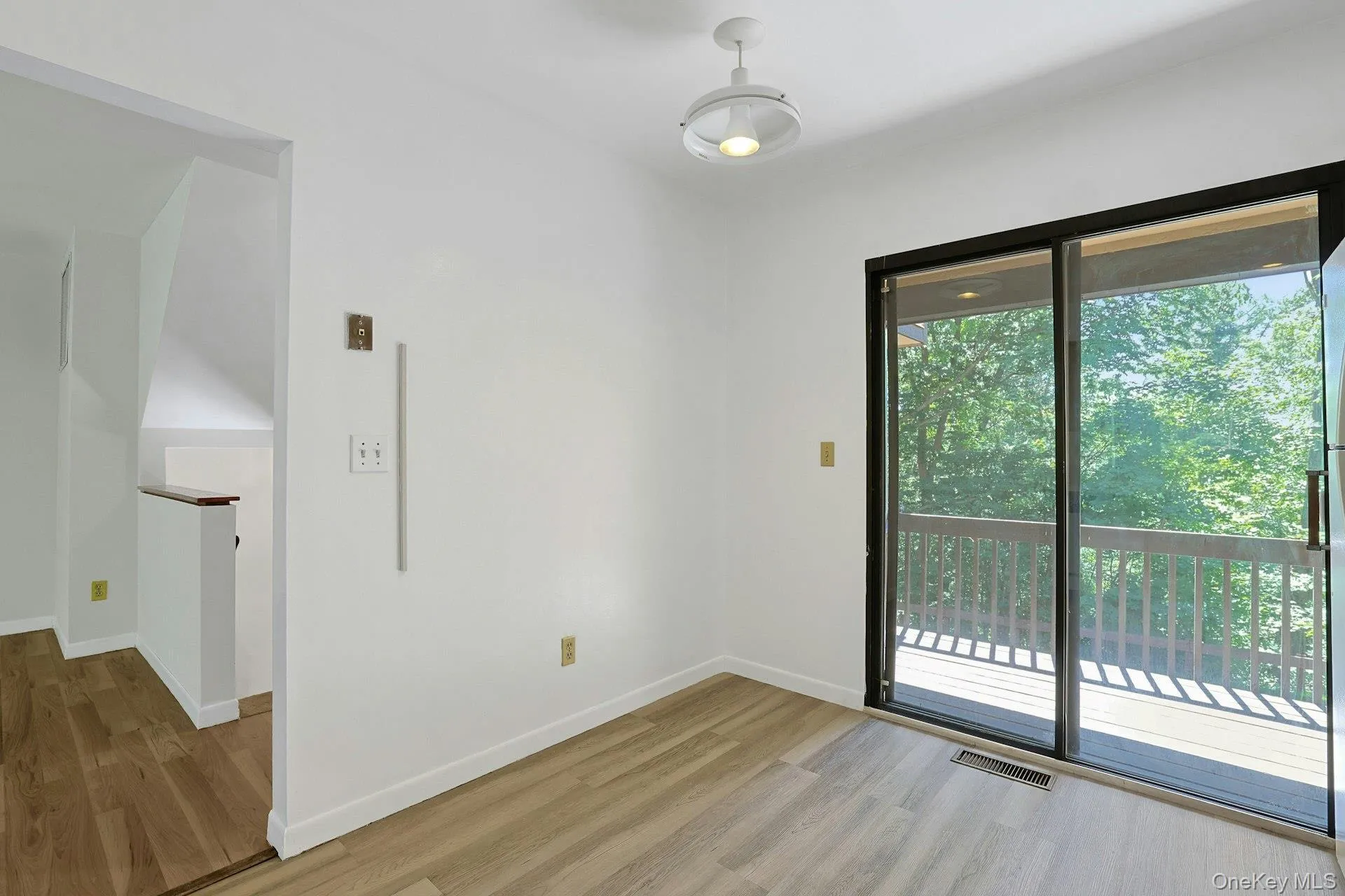This view shows the dining area of the kitchen and the sliding doors to the large, private balcony. This view shows the dining area of the kitchen and the sliding doors to the large, private balcony.