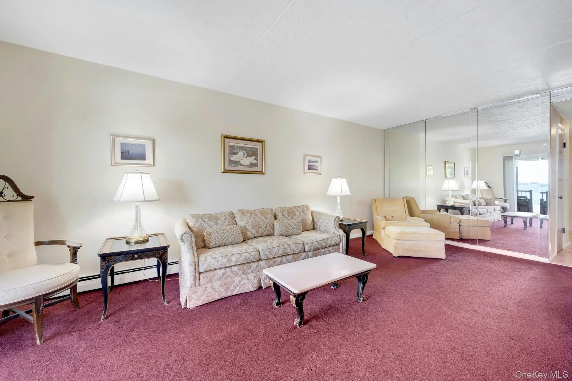 Living room featuring carpet Living room featuring carpet