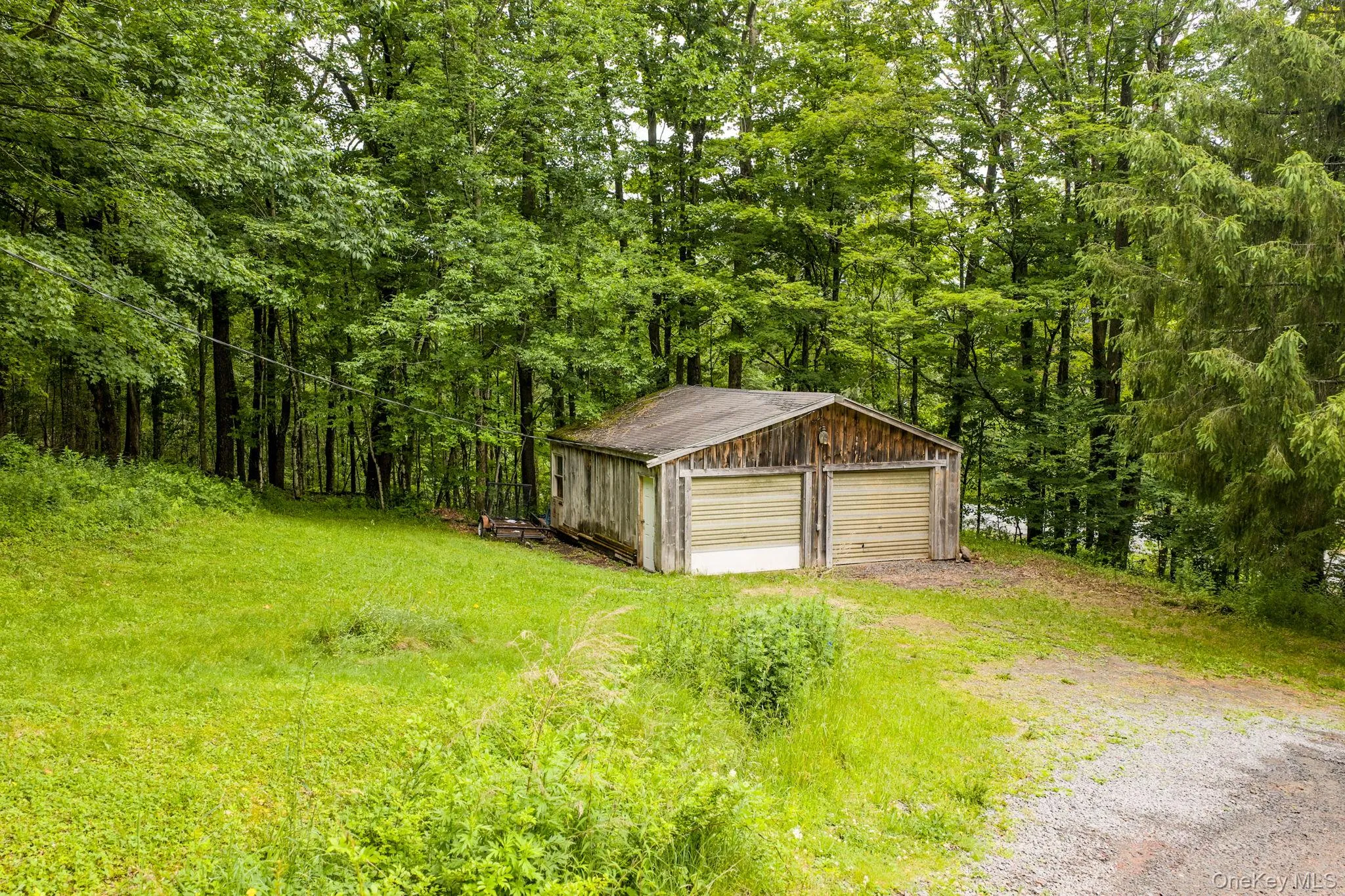 2 Car garage located at bottom of Driveway 2 Car garage located at bottom of Driveway