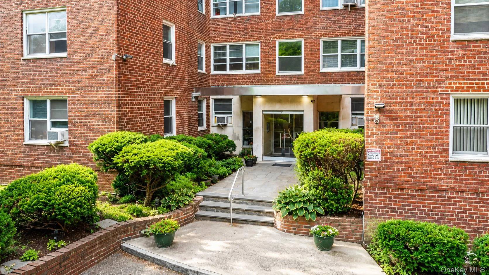 Welcome home! Enjoy a warm welcome with a landscaped front entry as you walk into the building. Welcome home! Enjoy a warm welcome with a landscaped front entry as you walk into the building.