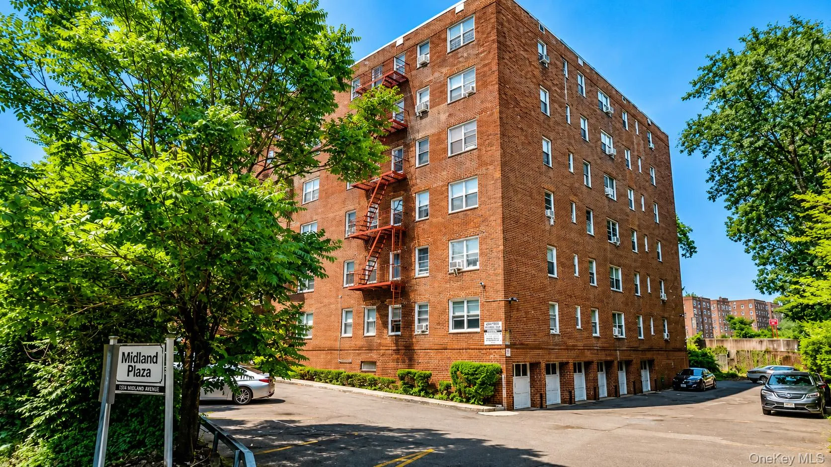 Attractive view of this meticulously maintained co-op building featuring one assigned parking space for added convenience. Attractive view of this meticulously maintained co-op building featuring one assigned parking space for added convenience.