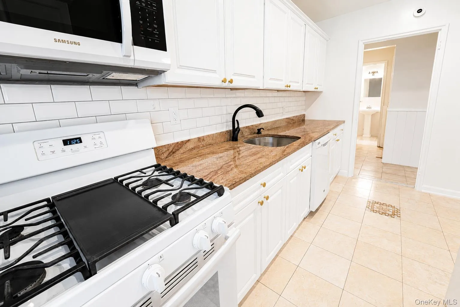 Gas stove, fridge, microwave and dishwasher. Gas stove, fridge, microwave and dishwasher.