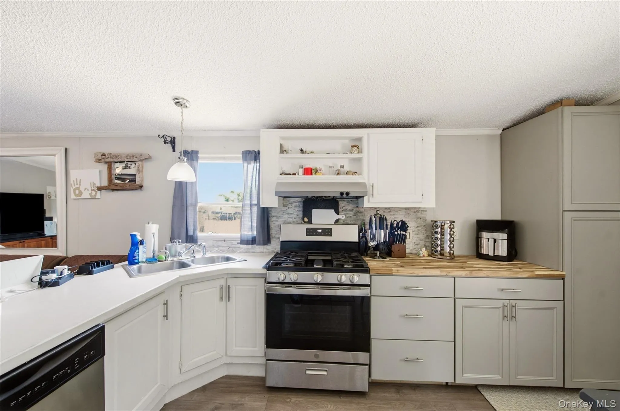 Kitchen offers ample cabinet space Kitchen offers ample cabinet space